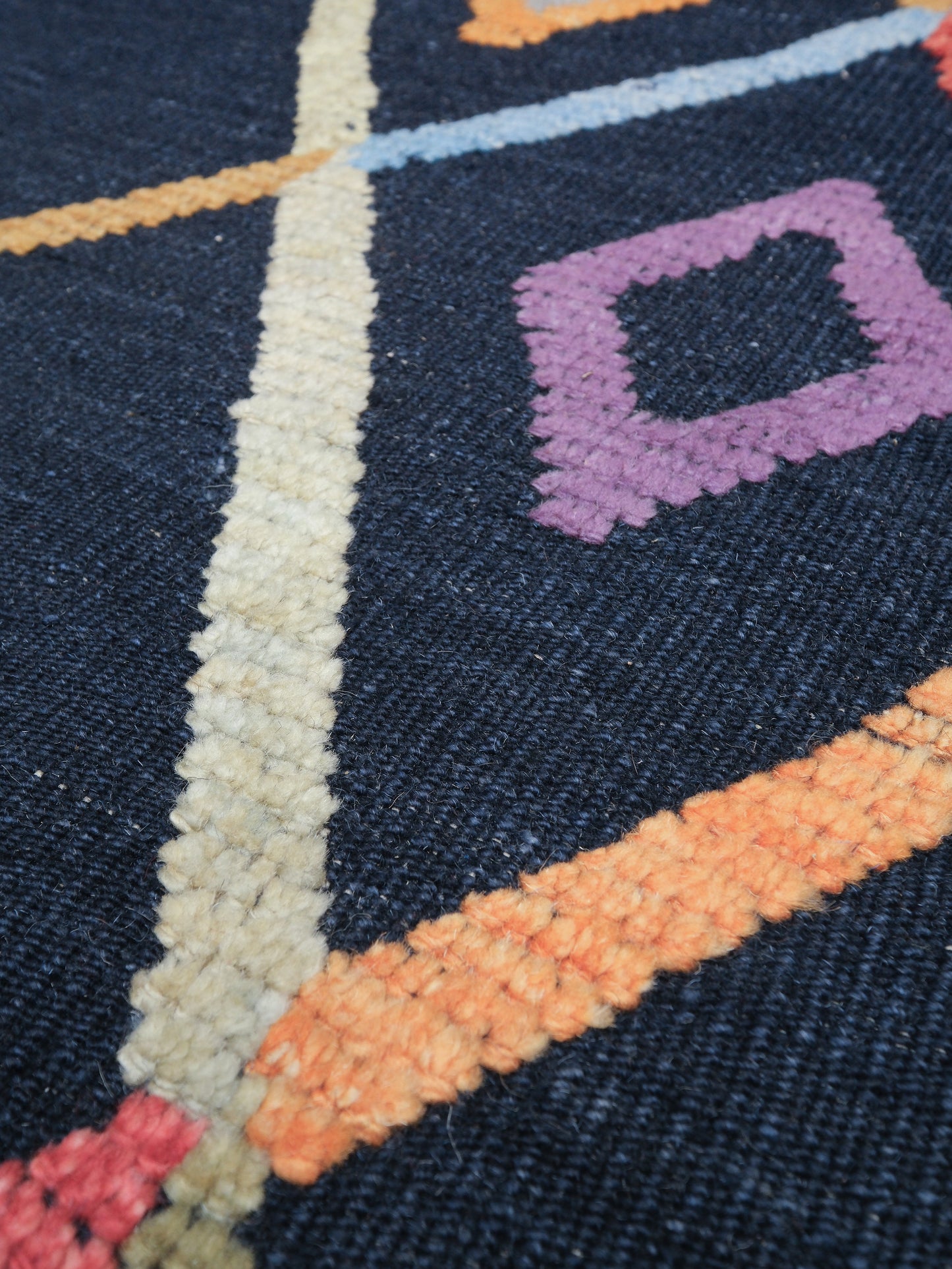 Modern Vibrant Turkish Tulu handmade wool a geometric patterned area rug 9x12 from Indigo Rugs Burlingame Bay Area.