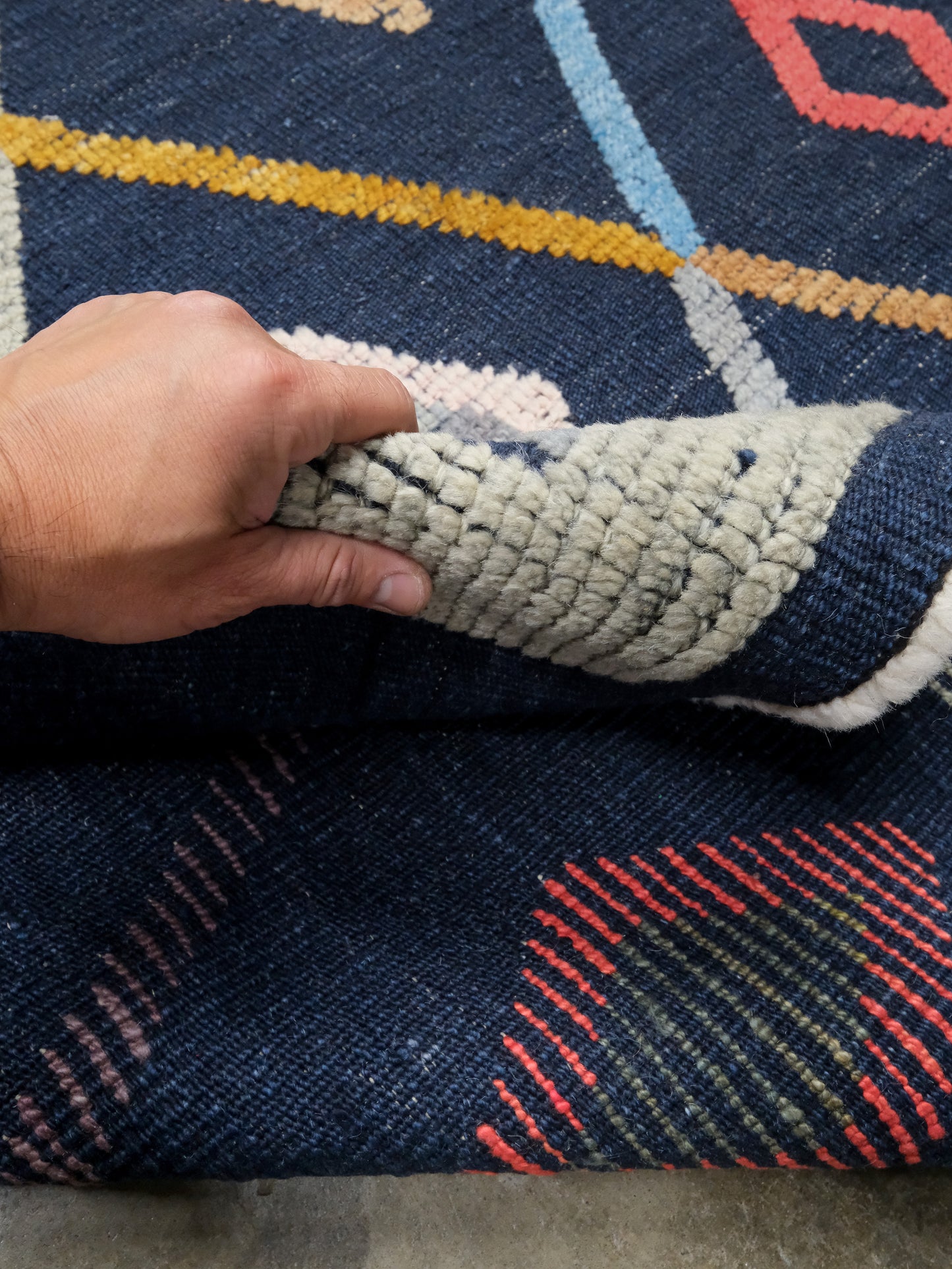 Modern Vibrant Turkish Tulu handmade wool a geometric patterned area rug 9x12 from Indigo Rugs Burlingame Bay Area.