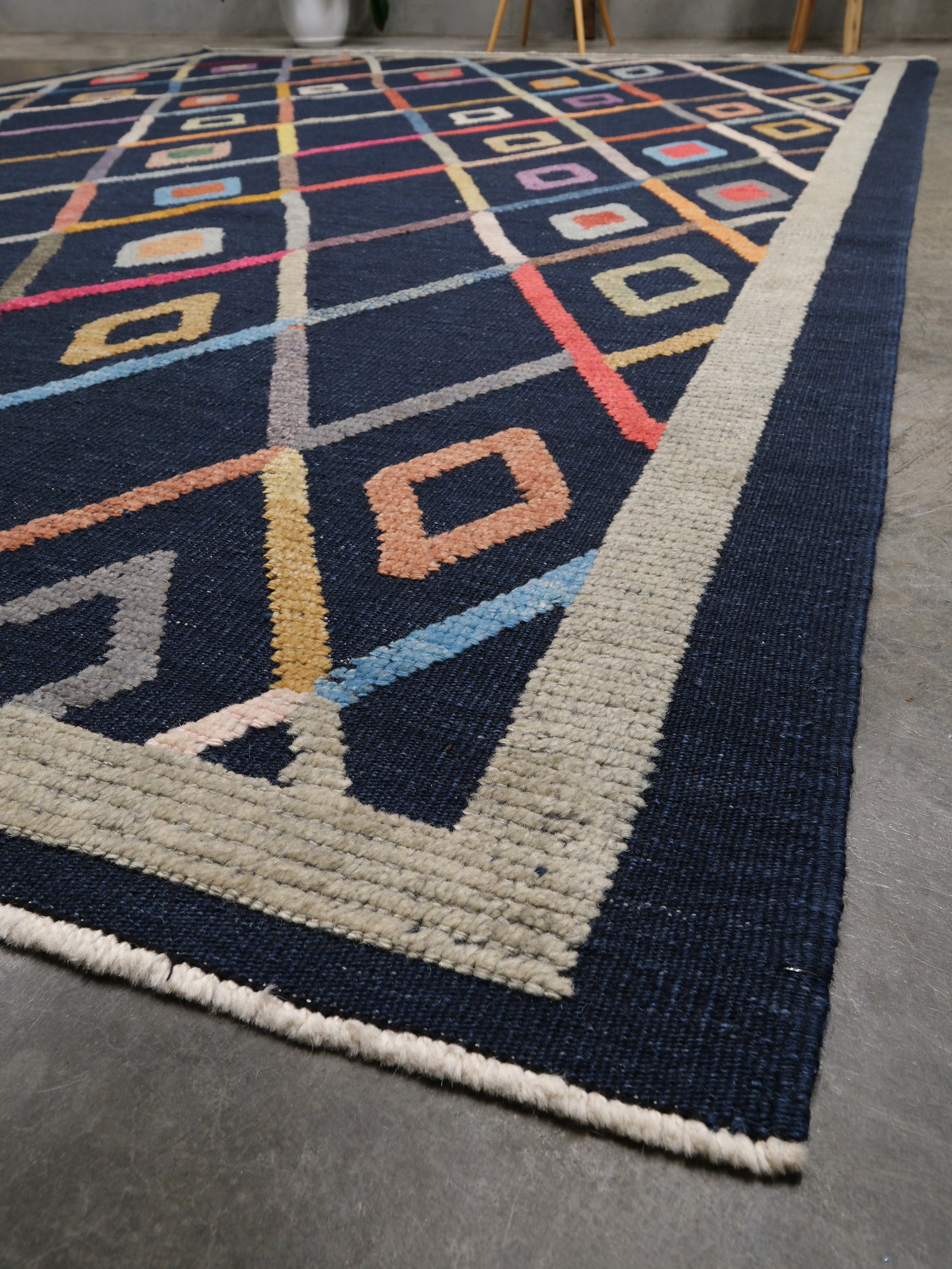 Modern Vibrant Turkish Tulu handmade wool a geometric patterned area rug 9x12 from Indigo Rugs Burlingame Bay Area.