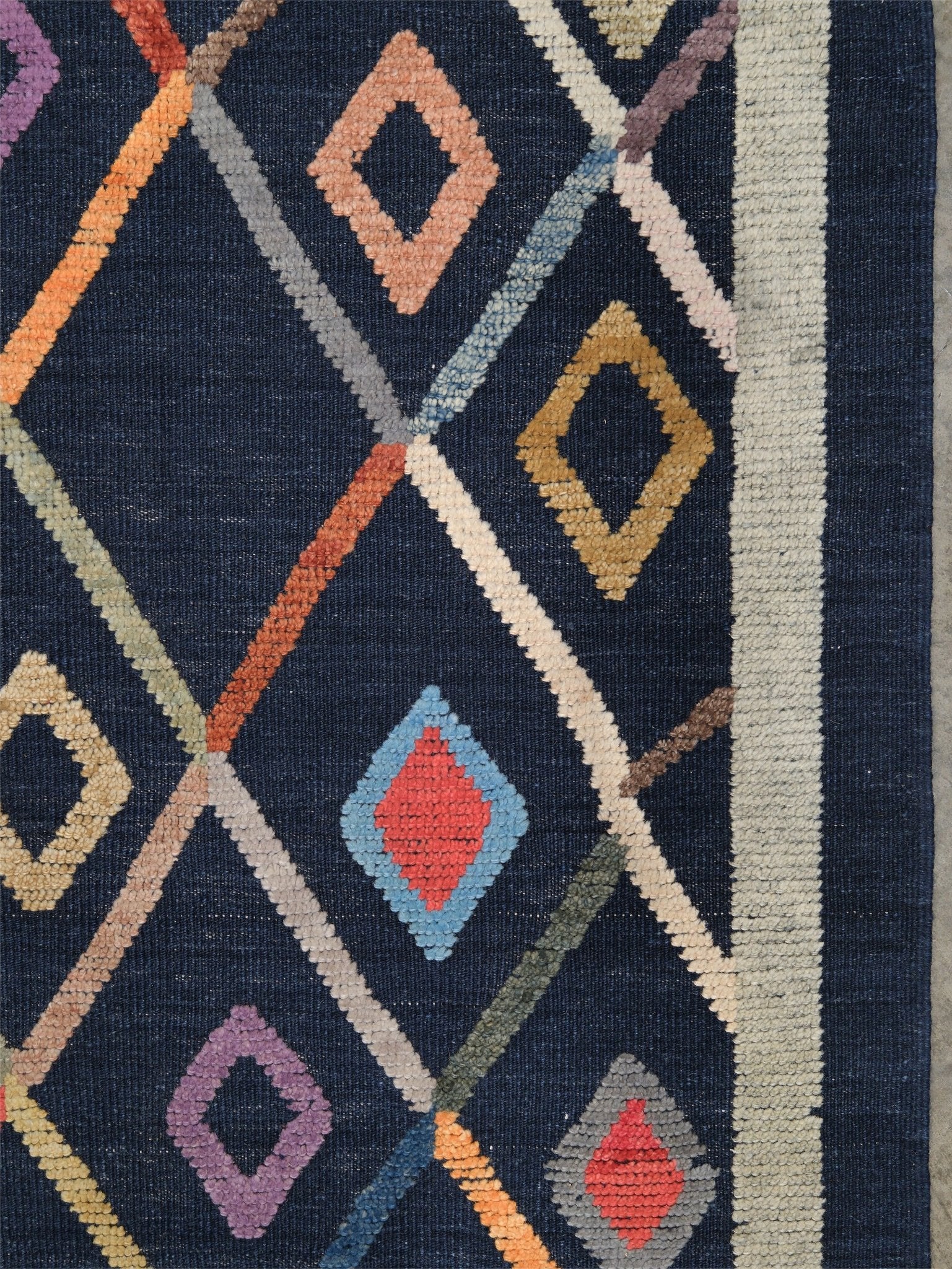 Modern Vibrant Turkish Tulu handmade wool a geometric patterned area rug 9x12 from Indigo Rugs Burlingame Bay Area.