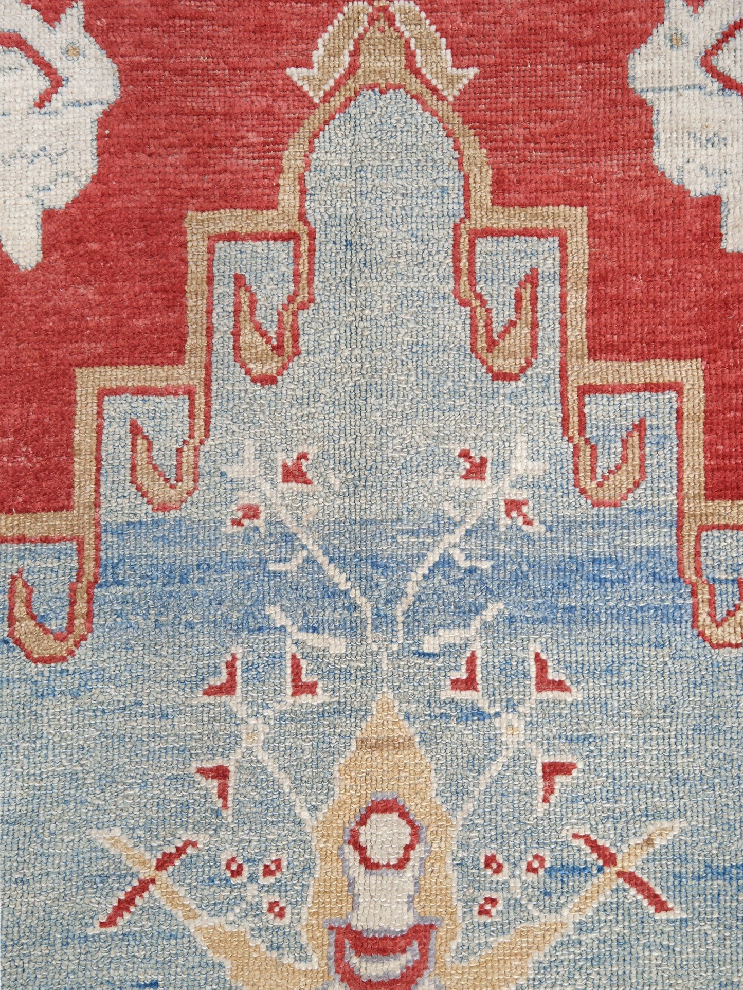 Vibrant soft sky blue and coral red 7x10 Turkish Oushak rug with central medallion, golden beige border, floral motifs and warm ivory accents, handmade wool from Indigo Rugs Burlingame Bay Area.