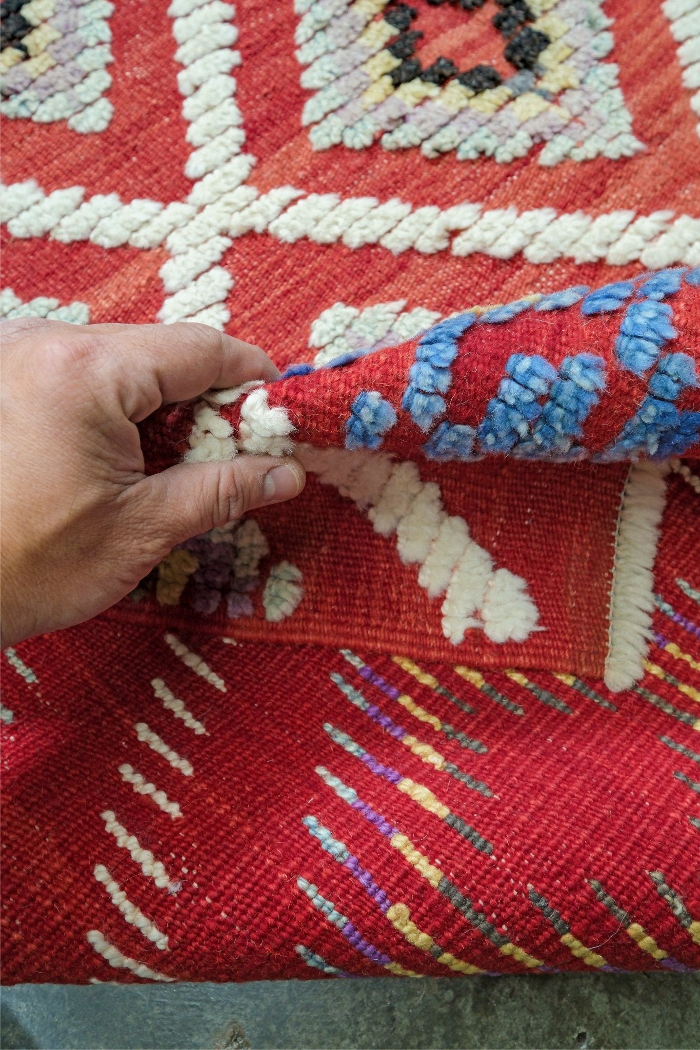 Red Turkish Tulu rug with ivory diamond lattice, raised wool texture, lavender, gray-blue, accents, 6x9 handmade moroccan style area rug from Indigo Rugs Burlingame Bay Area.