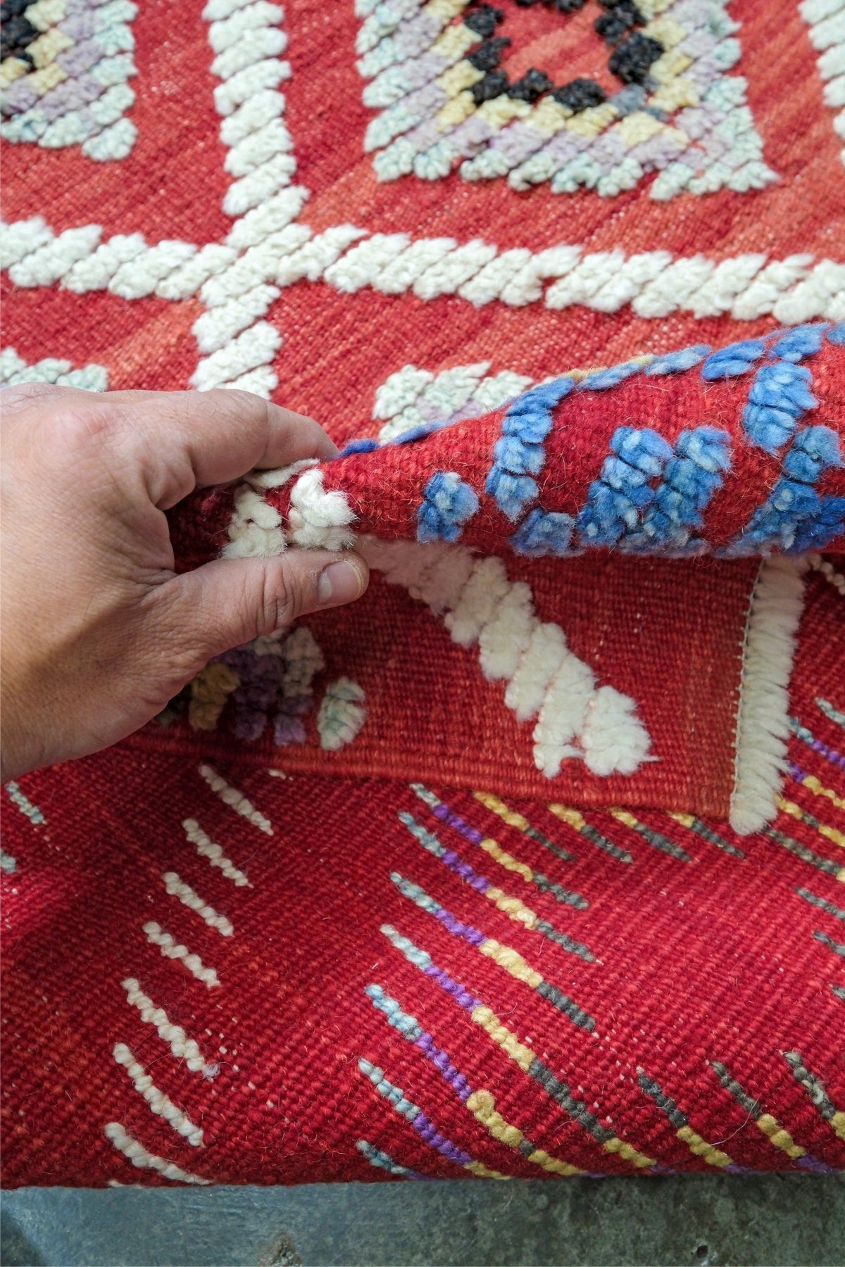 Red Turkish Tulu rug with ivory diamond lattice, raised wool texture, lavender, gray-blue, accents, 6x9 handmade moroccan style area rug from Indigo Rugs Burlingame Bay Area.