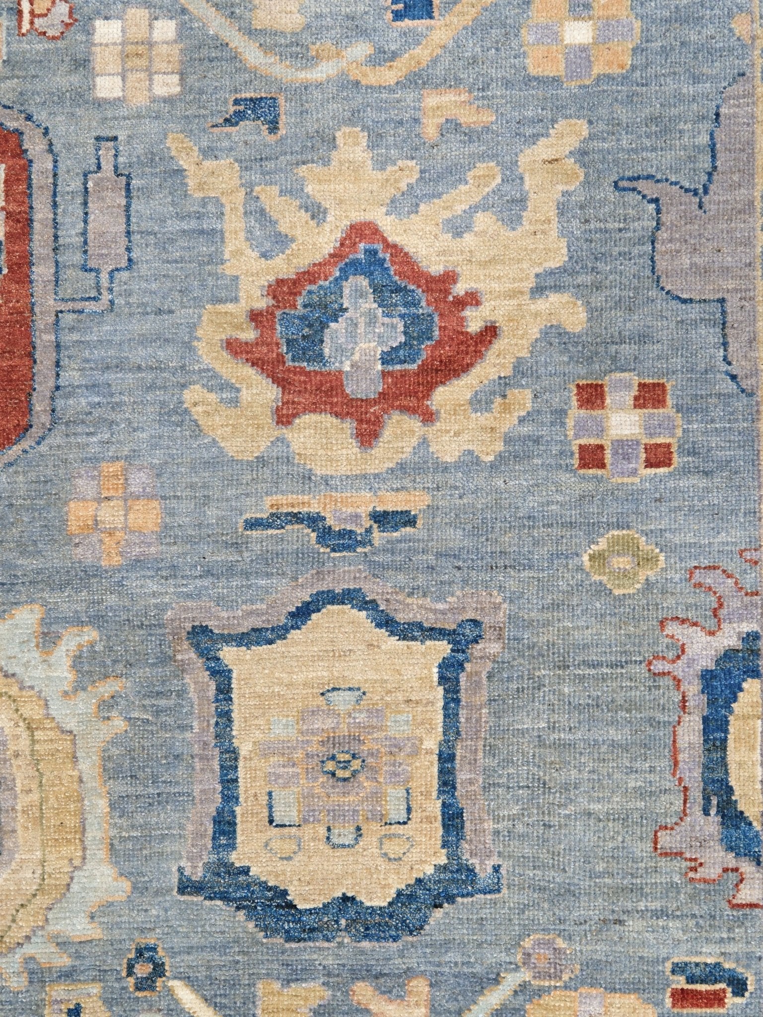 Powder blue Turkish Oushak rug with pale lavender border, warm ivory floral motifs, hand-knotted wool area rug 8x10 from Indigo Rugs Burlingame Bay Area.