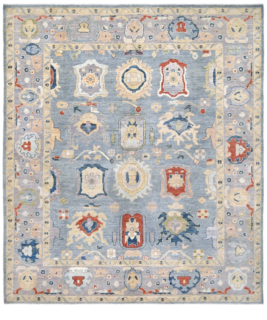Powder blue Turkish Oushak rug with pale lavender border, warm ivory floral motifs, hand-knotted wool area rug 8x10 from Indigo Rugs Burlingame Bay Area.