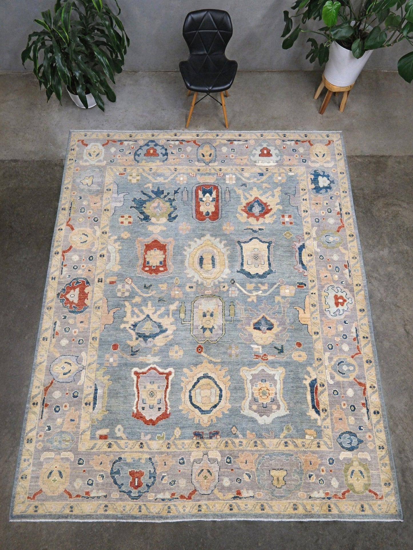Powder blue Turkish Oushak rug with pale lavender border, warm ivory floral motifs, hand-knotted wool area rug 8x10 from Indigo Rugs Burlingame Bay Area.