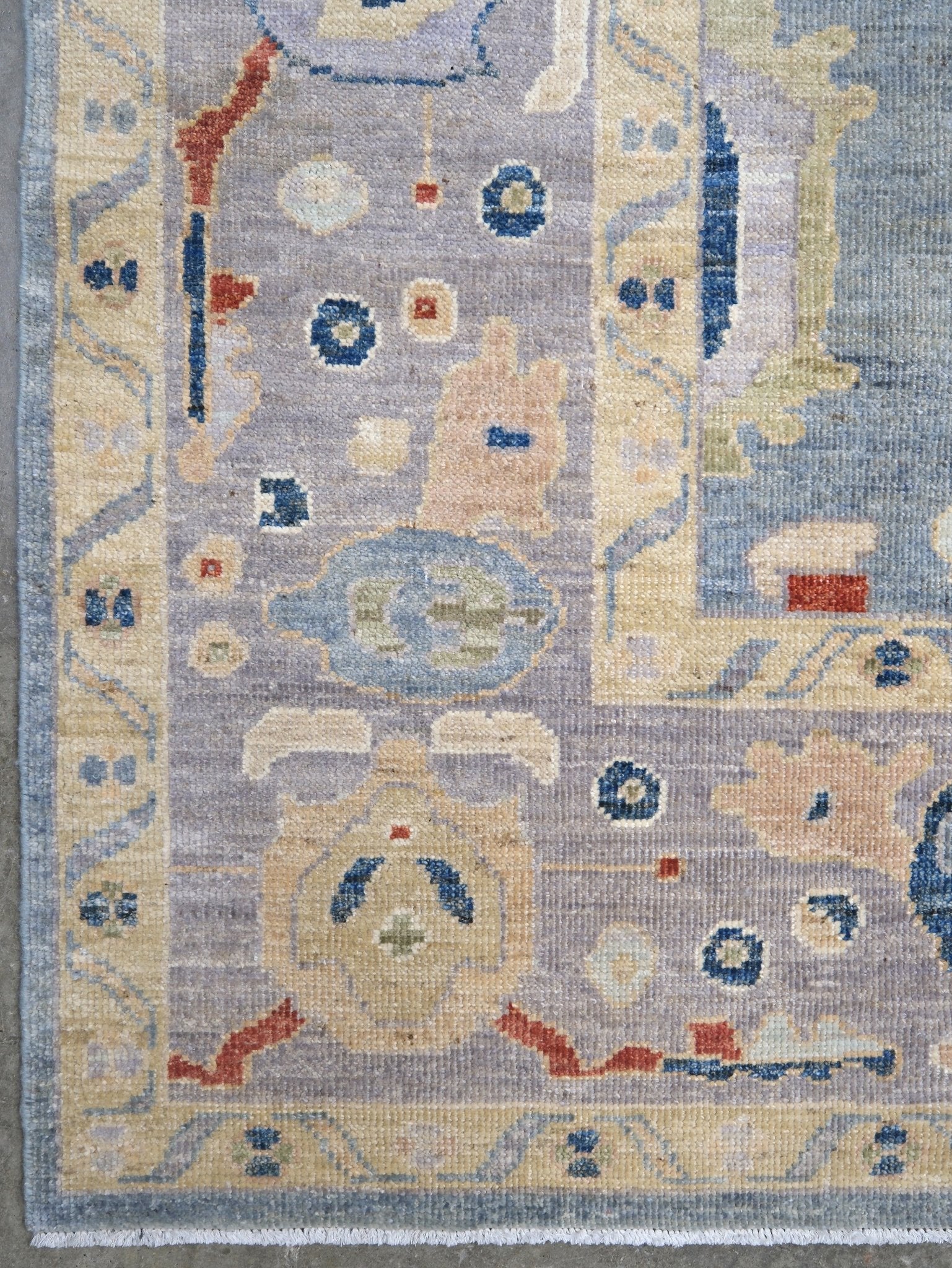 Powder blue Turkish Oushak rug with pale lavender border, warm ivory floral motifs, hand-knotted wool area rug 8x10 from Indigo Rugs Burlingame Bay Area.