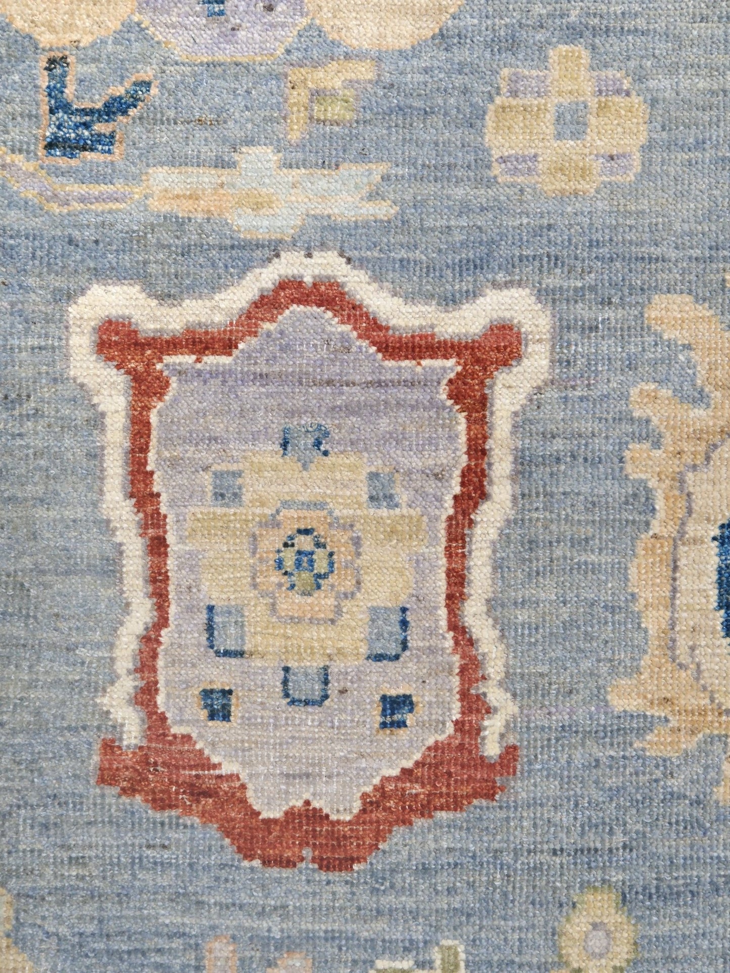 Powder blue Turkish Oushak rug with pale lavender border, warm ivory floral motifs, hand-knotted wool area rug 8x10 from Indigo Rugs Burlingame Bay Area.