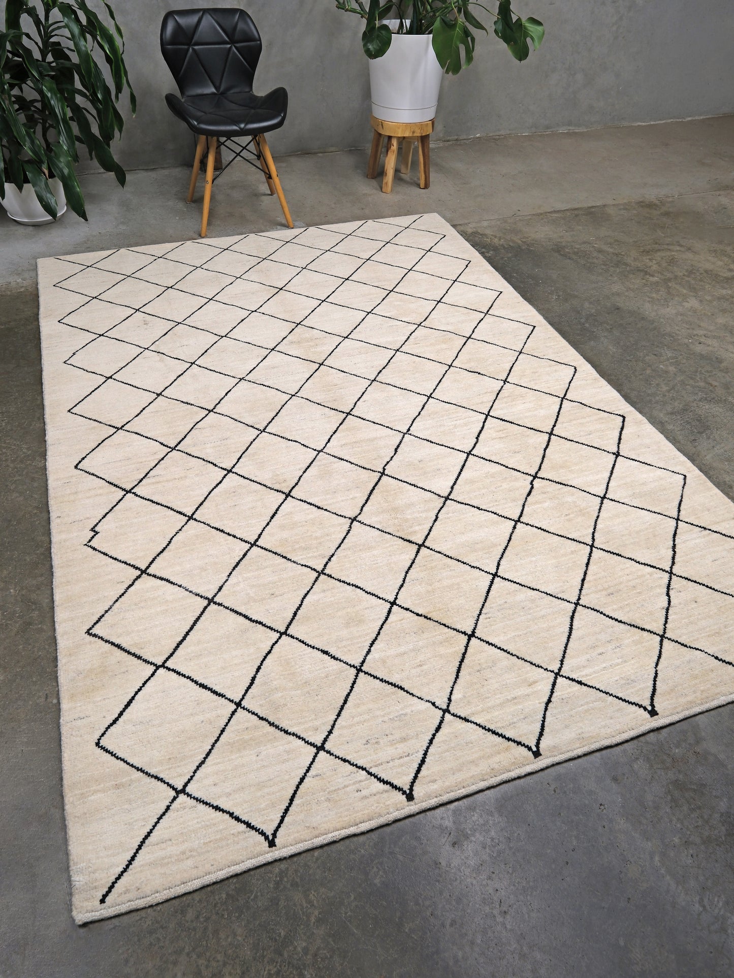 Ivory natural beige minimalist Moroccan handmade wool rug with black diamond pattern, soft cream field and organic modern geometric design, 6x8 from Indigo Rugs Burlingame Bay Area.
