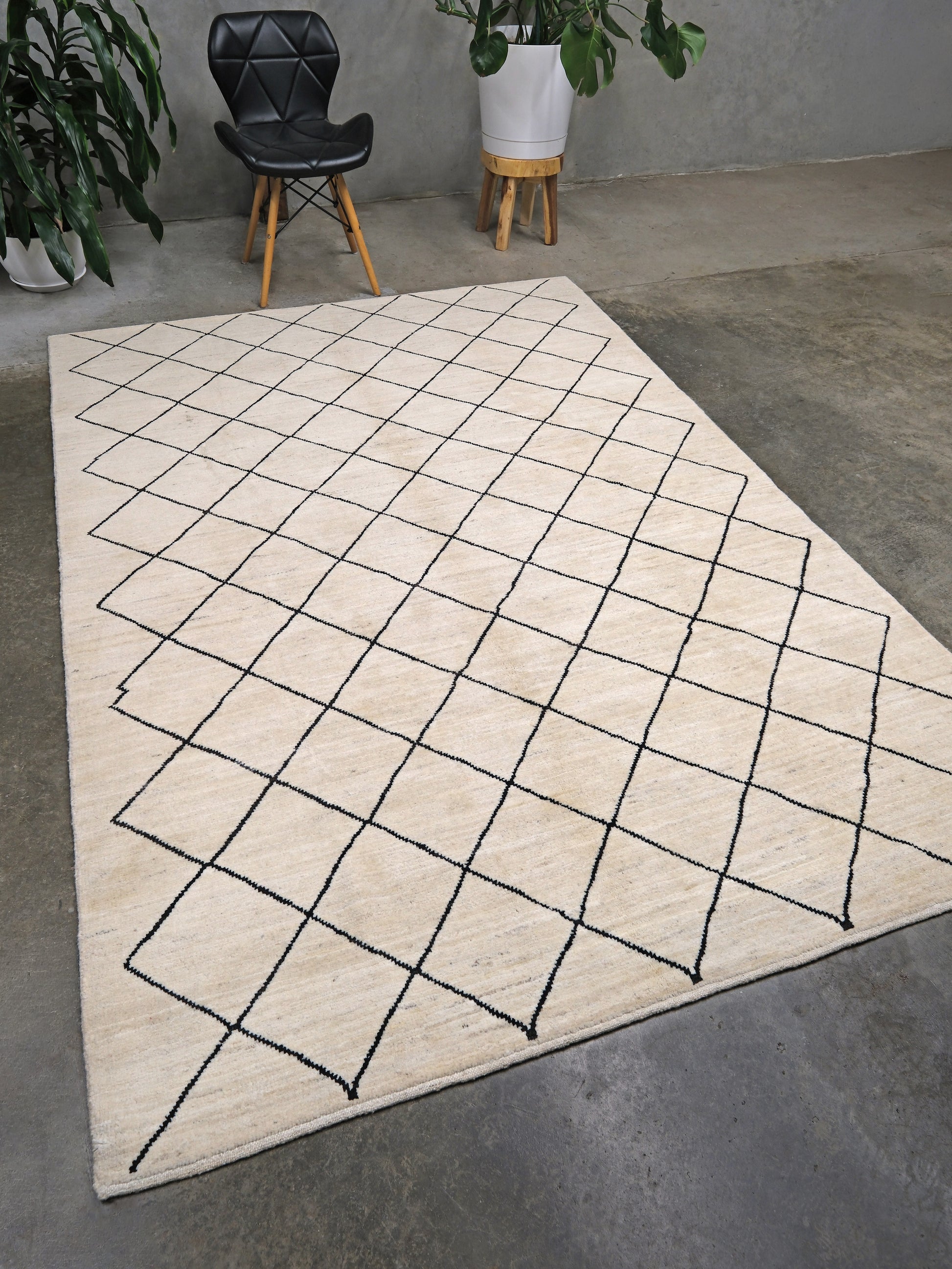 Ivory natural beige minimalist Moroccan handmade wool rug with black diamond pattern, soft cream field and organic modern geometric design, 6x8 from Indigo Rugs Burlingame Bay Area.