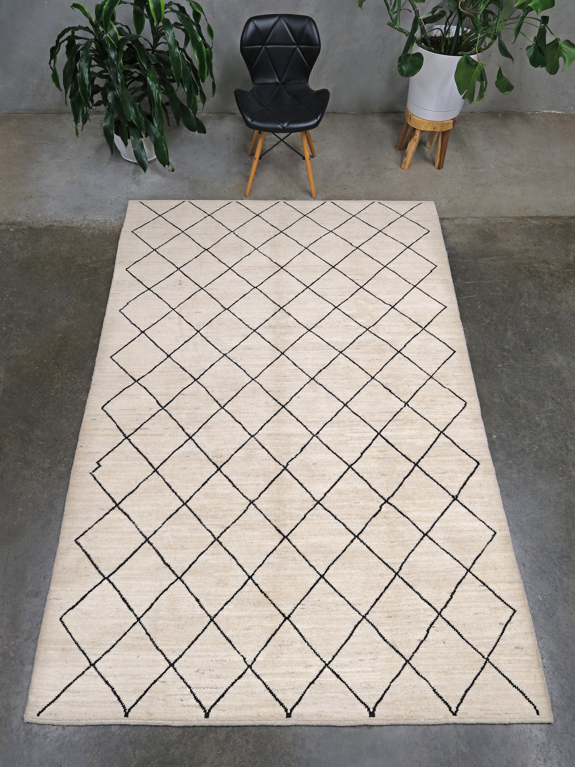 Ivory natural beige minimalist Moroccan handmade wool rug with black diamond pattern, soft cream field and organic modern geometric design, 6x8 from Indigo Rugs Burlingame Bay Area.