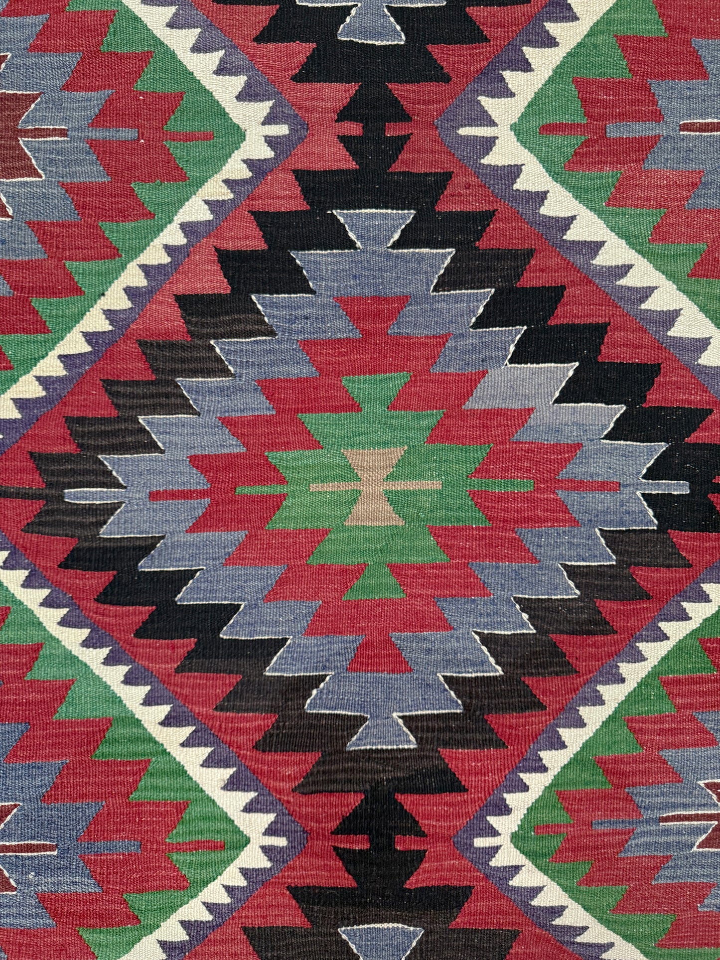 Vintage Esme Turkish kilim featuring navajo style geometric design, handwoven wool flatweave rug 6x9