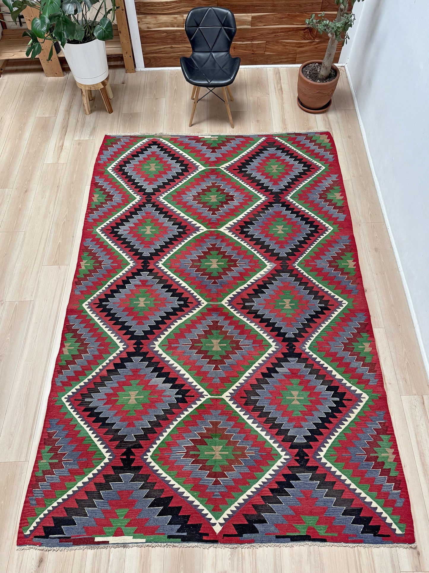 Vintage Esme Turkish kilim featuring navajo style geometric design, handwoven wool flatweave rug 6x9