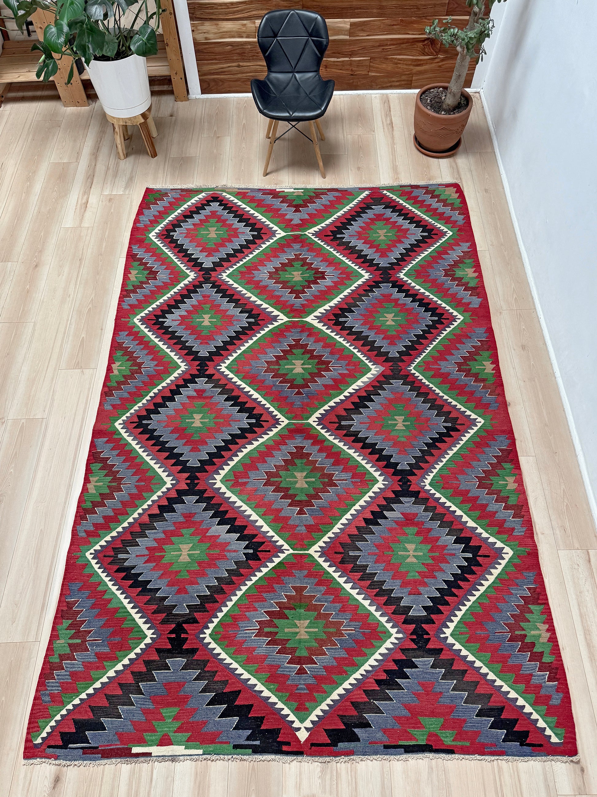 Vintage Esme Turkish kilim featuring navajo style geometric design, handwoven wool flatweave rug 6x9
