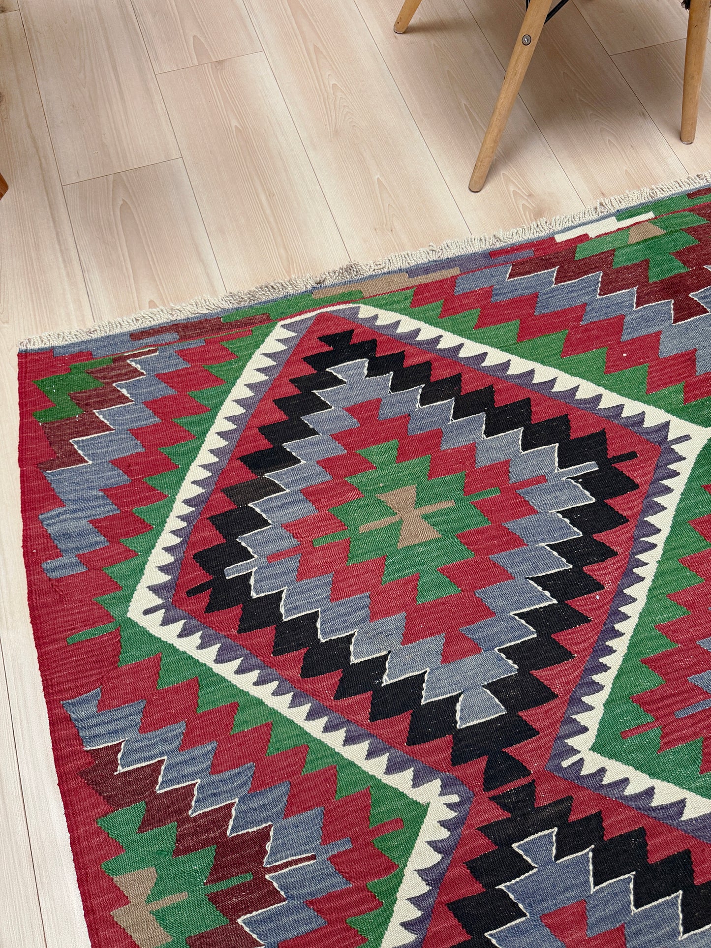 Vintage Esme Turkish kilim featuring navajo style geometric design, handwoven wool flatweave rug 6x9
