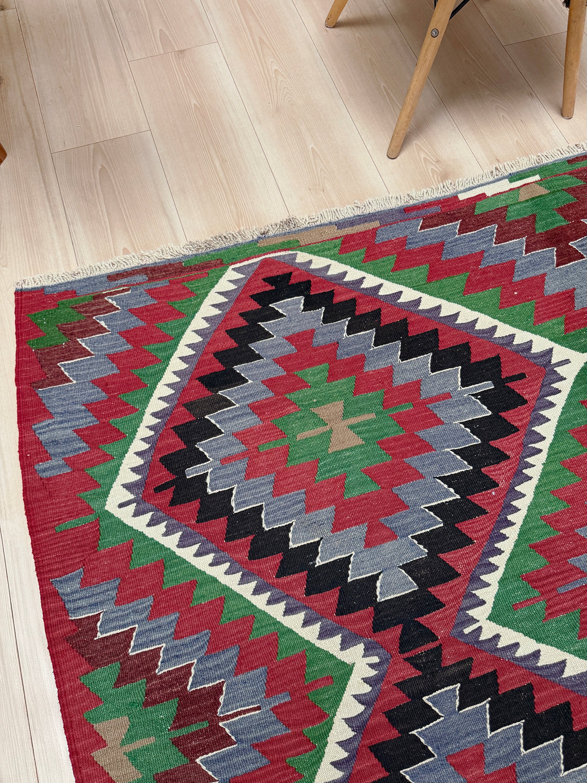 Vintage Esme Turkish kilim featuring navajo style geometric design, handwoven wool flatweave rug 6x9