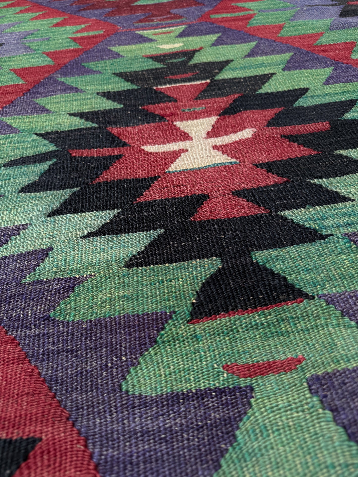 Vintage Esme Turkish tribal kilim rug featuring geometric design in raspberry red, blue violet, emerald green, handmade 6x10 perfect for boho style 