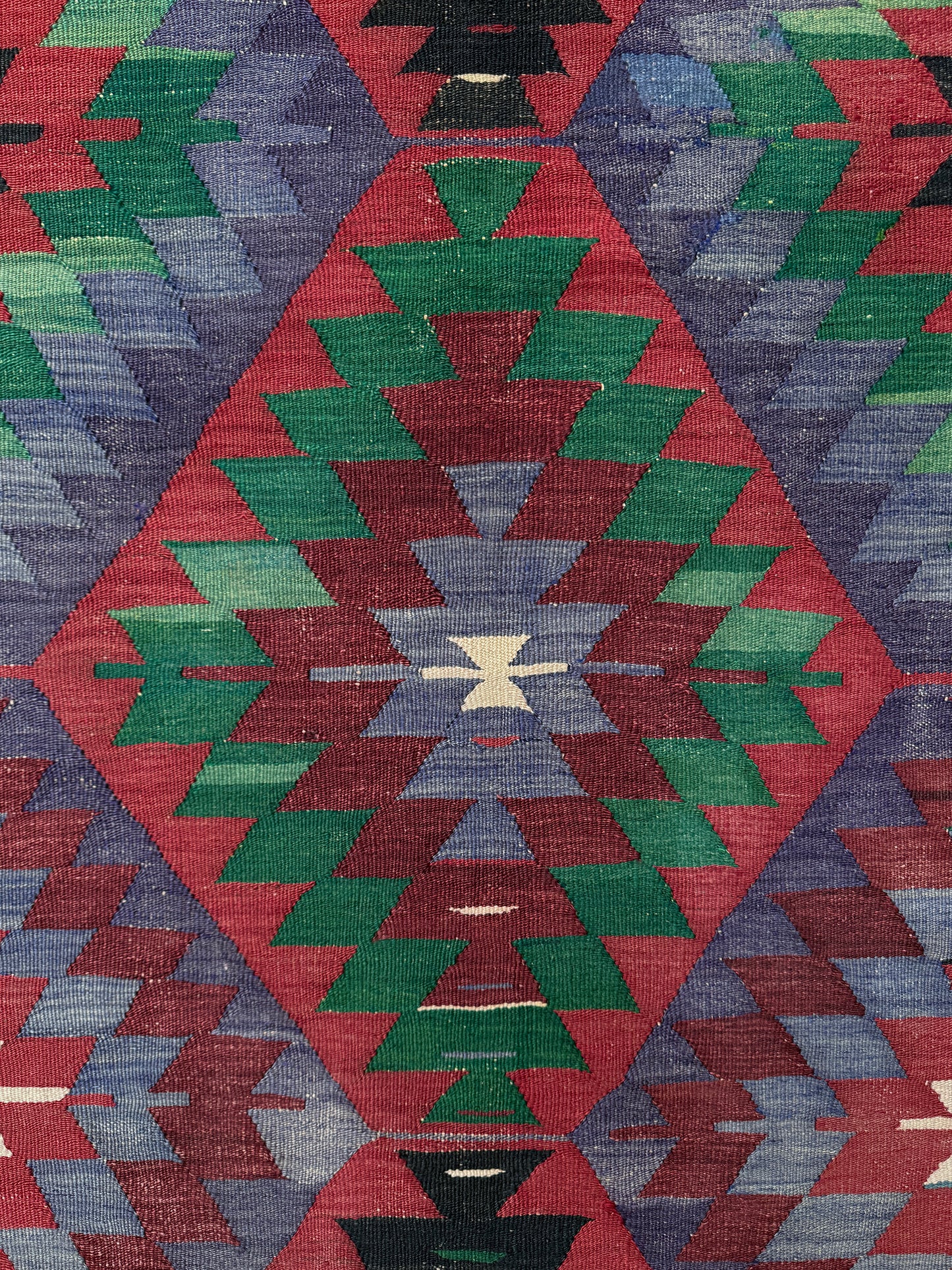 Vintage Esme Turkish tribal kilim rug featuring geometric design in raspberry red, blue violet, emerald green, handmade 6x10 perfect for boho style 