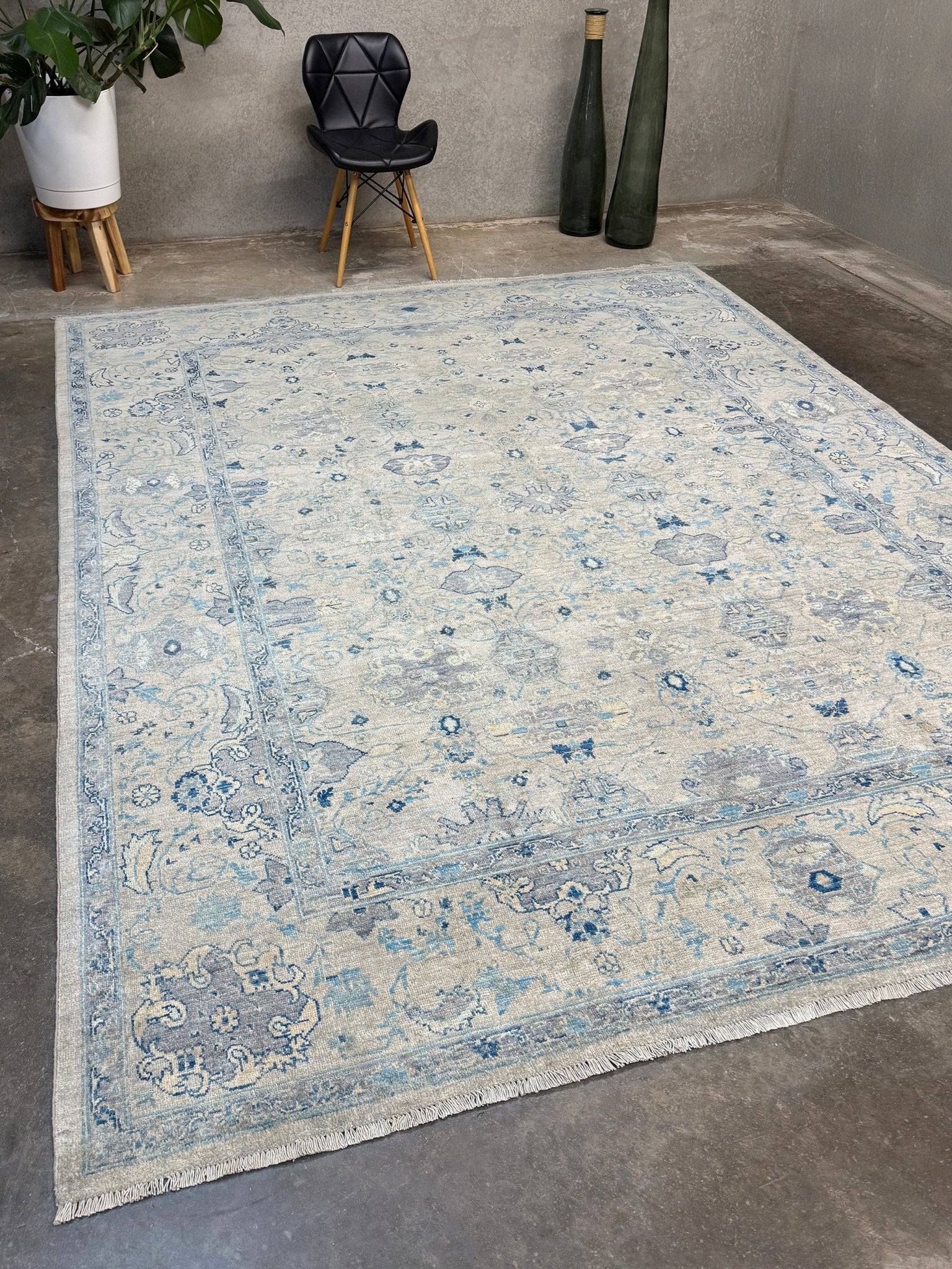 Neutral transitional handmade 8x10 rug with muted gray, ivory, and layered blue tones. Soft Sultanabad-inspired floral motifs, perfect for living rooms, dining spaces, or bedrooms. Contemporary yet timeless, from a rug shop in Burlingame, San Francisco Bay Area, CA with free shipping.
