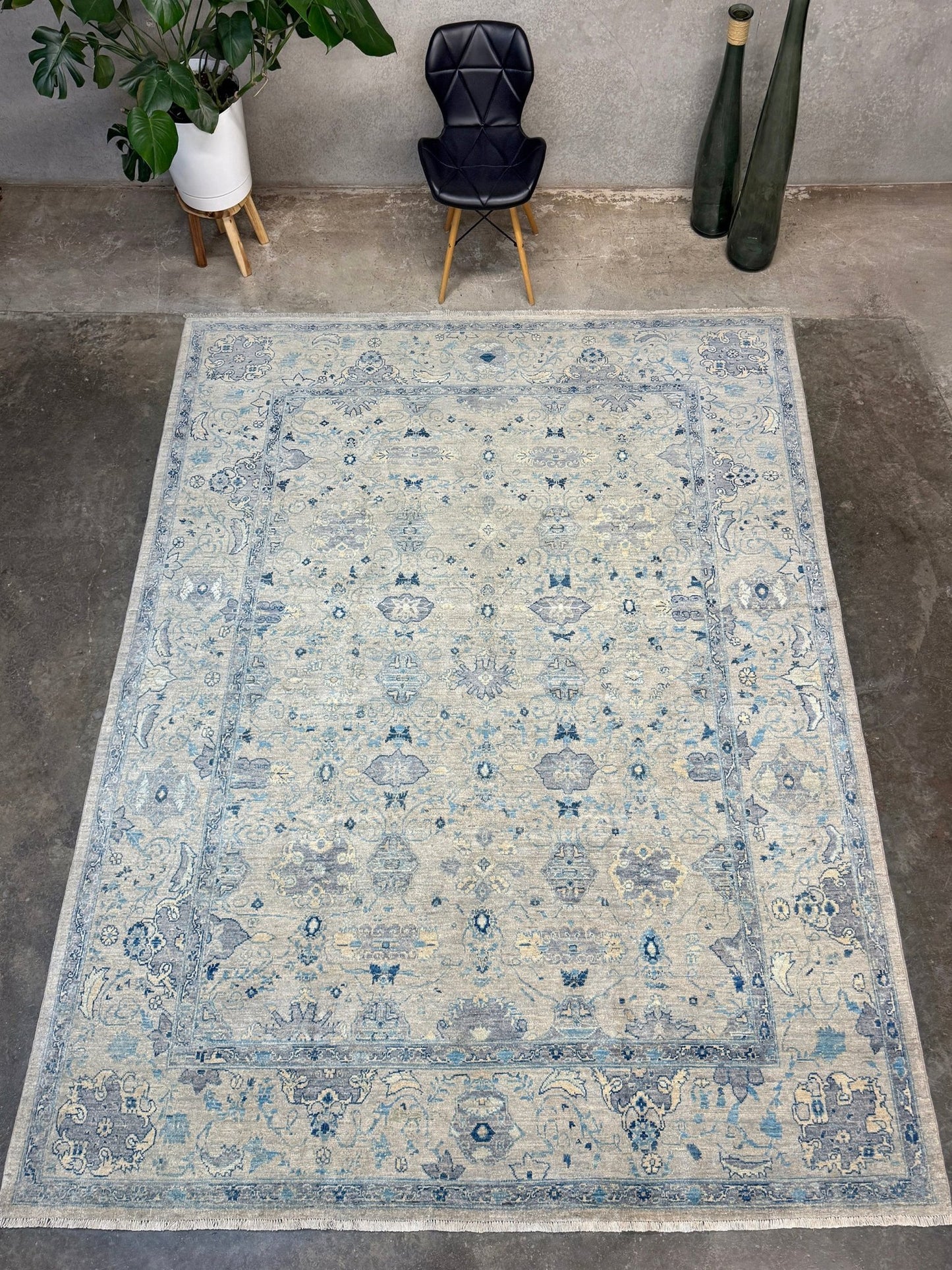 Neutral transitional handmade 8x10 rug with muted gray, ivory, and layered blue tones. Soft Sultanabad-inspired floral motifs, perfect for living rooms, dining spaces, or bedrooms. Contemporary yet timeless, from a rug shop in Burlingame, San Francisco Bay Area, CA with free shipping.
