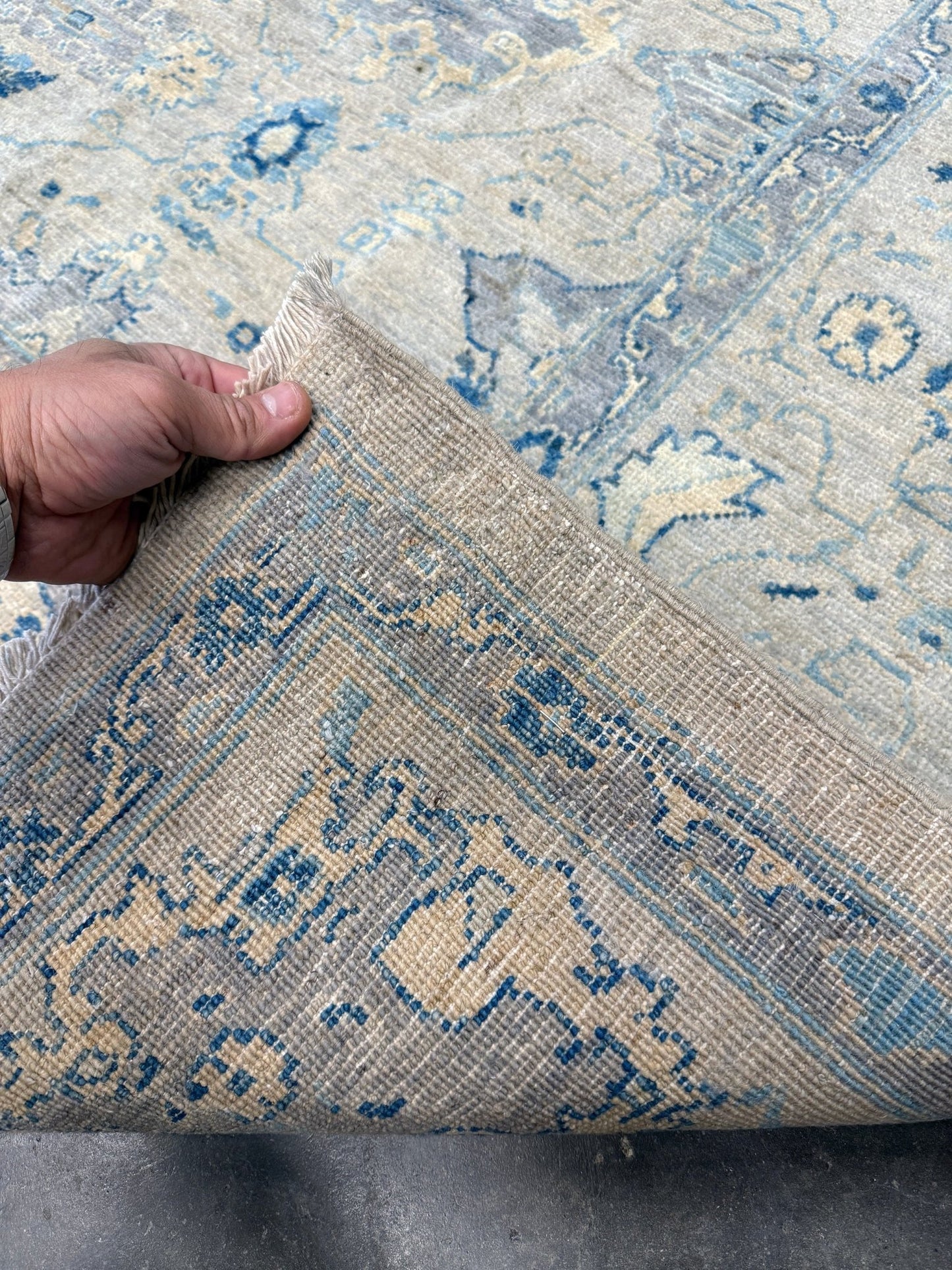 Neutral transitional handmade 8x10 decorative rug with muted gray, ivory, and layered blue tones. Soft Sultanabad-inspired floral motifs, perfect for living rooms, dining spaces, or bedrooms. Contemporary yet timeless, from a rug shop in Burlingame, San Francisco Bay Area, CA with free shipping.