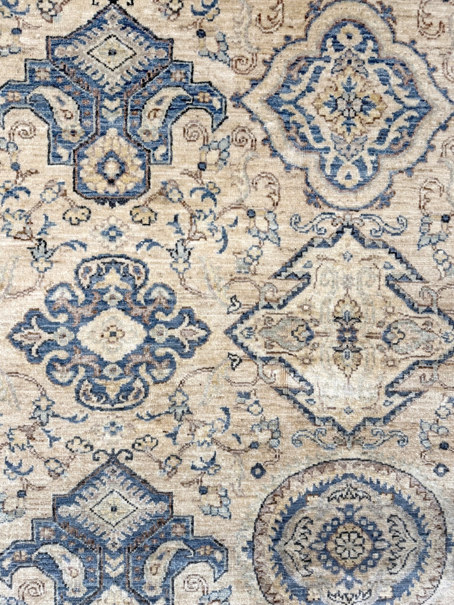 6x9 handmade transitional Ziegler Sultanabad Turkish rug in soft ivory, beige, and muted blue tones with a neutral, calming palette. Ideal for living rooms, dining rooms, and bedrooms in modern, rustic, or coastal décor. From a rug shop in Burlingame, San Francisco Bay Area, CA with free shipping.