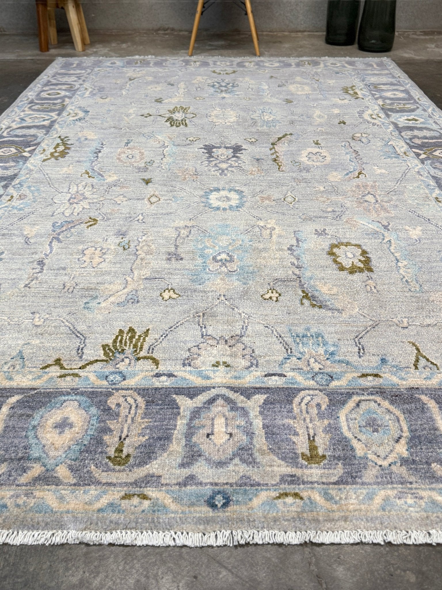 Handmade transitional 6x9 Turkish Oushak rug in silvery gray, powder blue, ivory, olive green, and muted lavender. Perfect for coastal, farmhouse, or light modern interiors — available at Indigo Rugs, Burlingame CA. Free Shipping