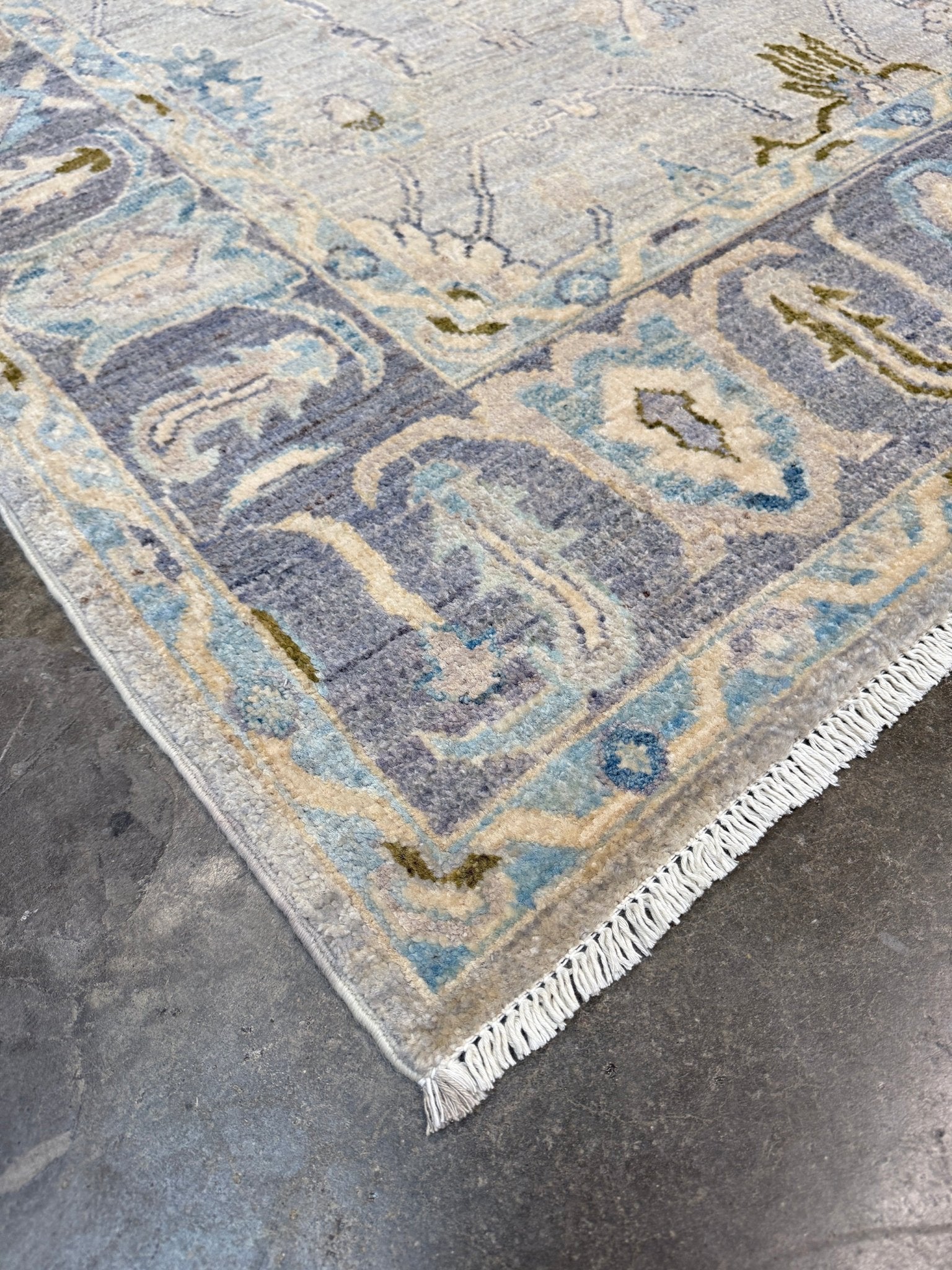 Handmade transitional 6x9 Turkish Oushak rug in silvery gray, powder blue, ivory, olive green, and muted lavender. Perfect for coastal, farmhouse, or light modern interiors — available at Indigo Rugs, Burlingame CA. Free Shipping