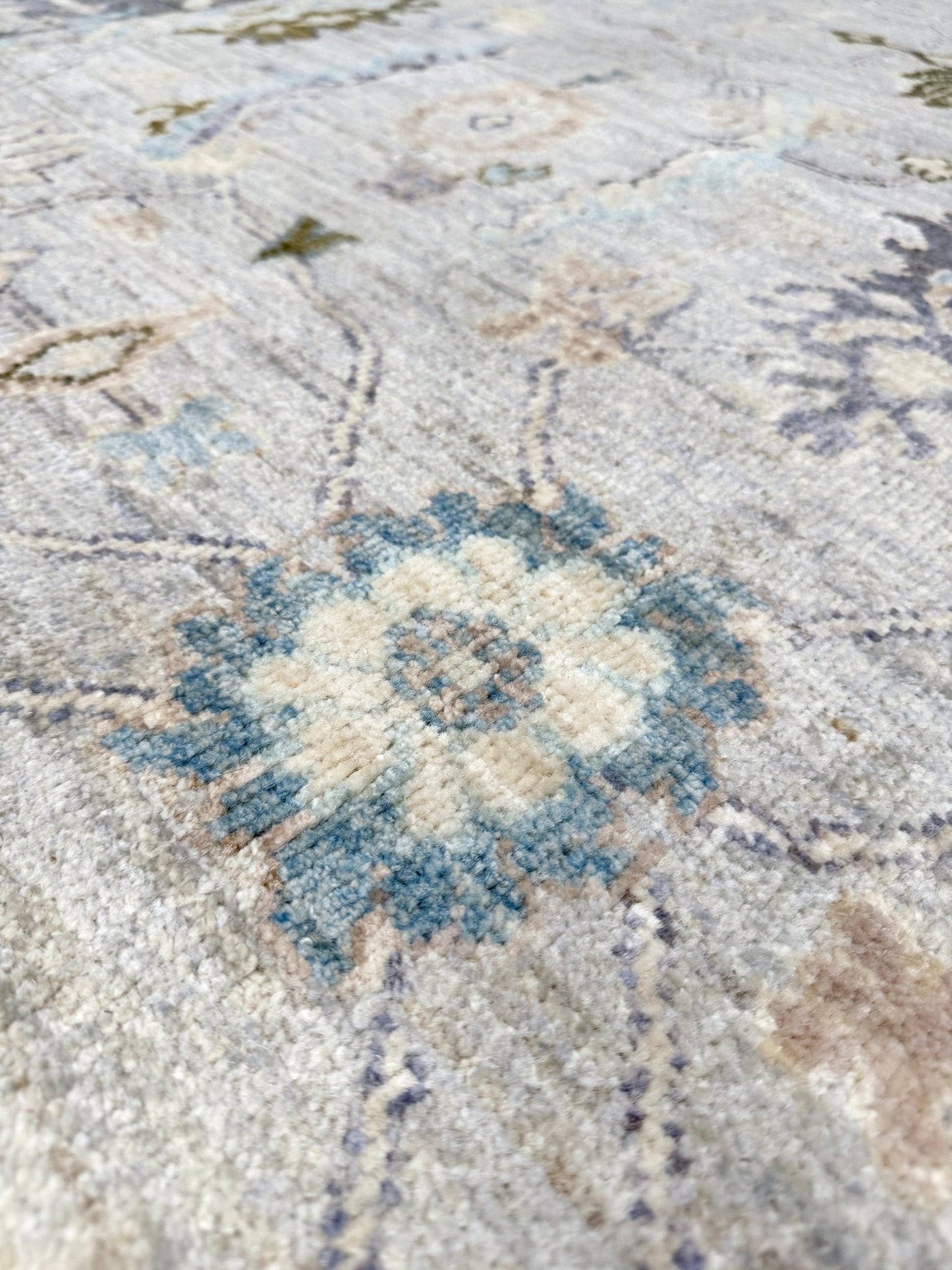 Handmade transitional 6x9 Turkish Oushak rug in silvery gray, powder blue, ivory, olive green, and muted lavender. Perfect for coastal, farmhouse, or light modern interiors — available at Indigo Rugs, Burlingame CA. Free Shipping