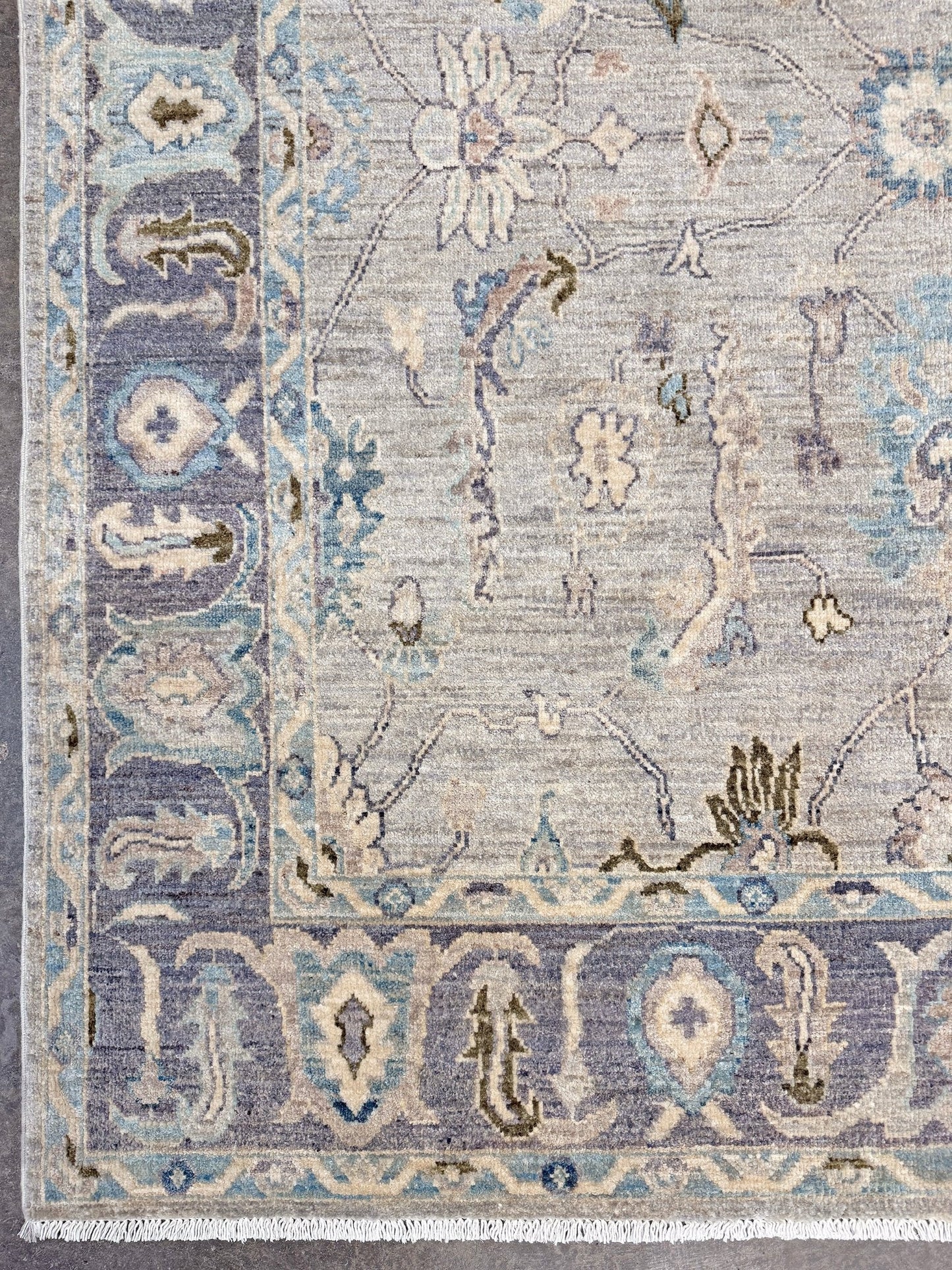 Handmade transitional 6x9 Turkish Oushak rug in silvery gray, powder blue, ivory, olive green, and muted lavender. Perfect for coastal, farmhouse, or light modern interiors — available at Indigo Rugs, Burlingame CA. Free Shipping