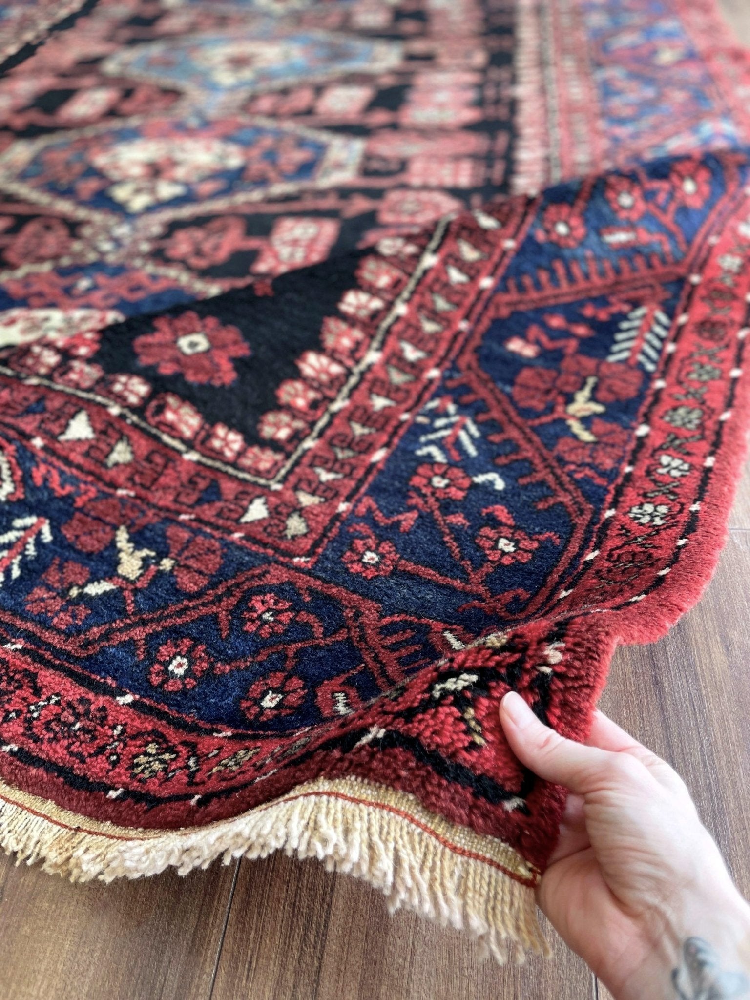 vintage Komurcu Kula Turkish rug with black brown field, madder red borders, handmade wool area rug 6x10 from Indigo Rugs Burlingame Bay Area.