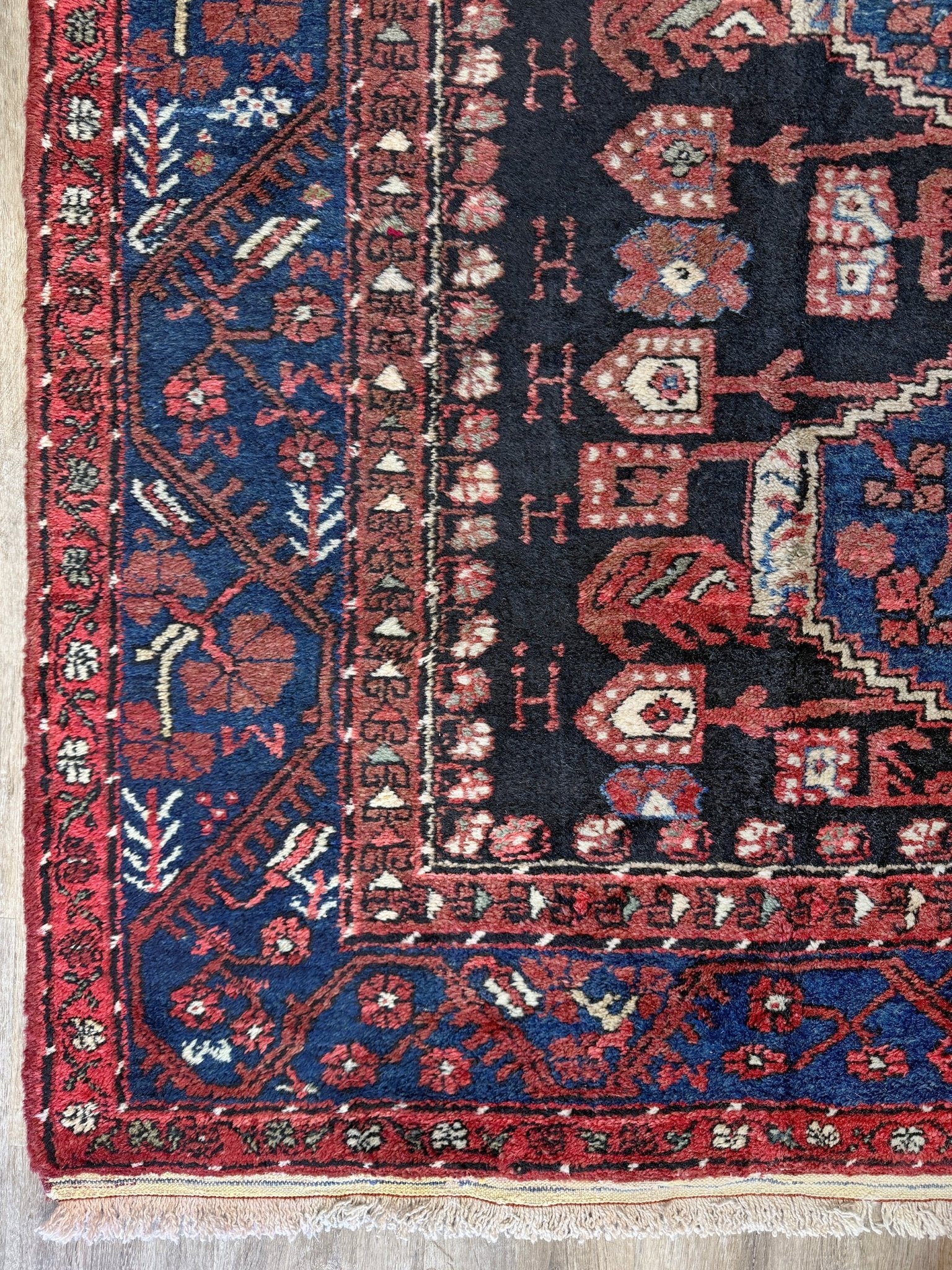 vintage Komurcu Kula Turkish rug with black brown field, madder red borders, handmade wool area rug 6x10 from Indigo Rugs Burlingame Bay Area.