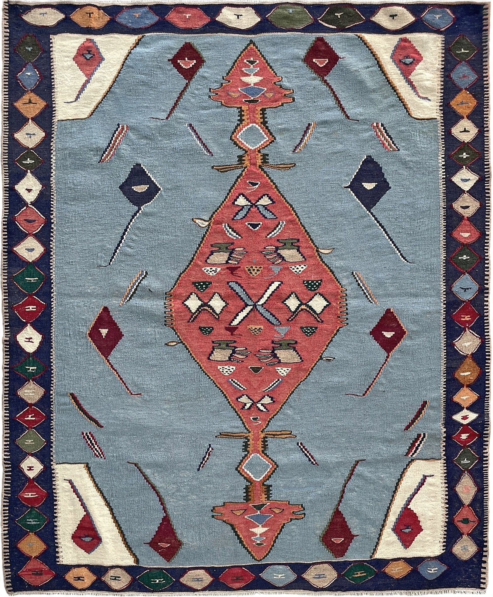 Decorative rug with geometric pattern on a blue background 4x5 persian senneh kilim rug. Kilim rug shop san francisco bay area