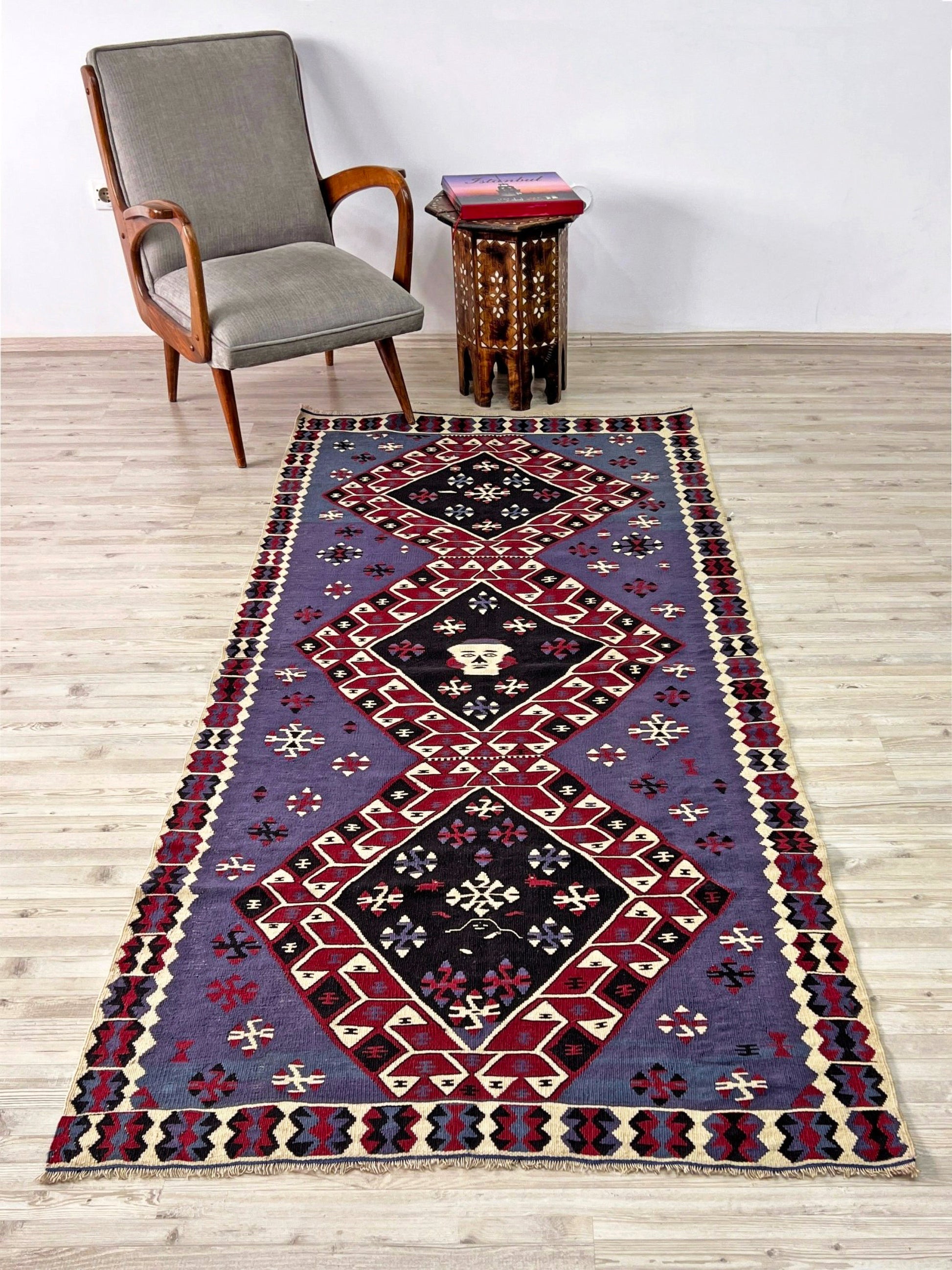Violet blue Vintage Eastern Turkish kilim runner, 4x8, with bold geometric medallions in garnet red, ivory, navy, and black on a deep blue ground.