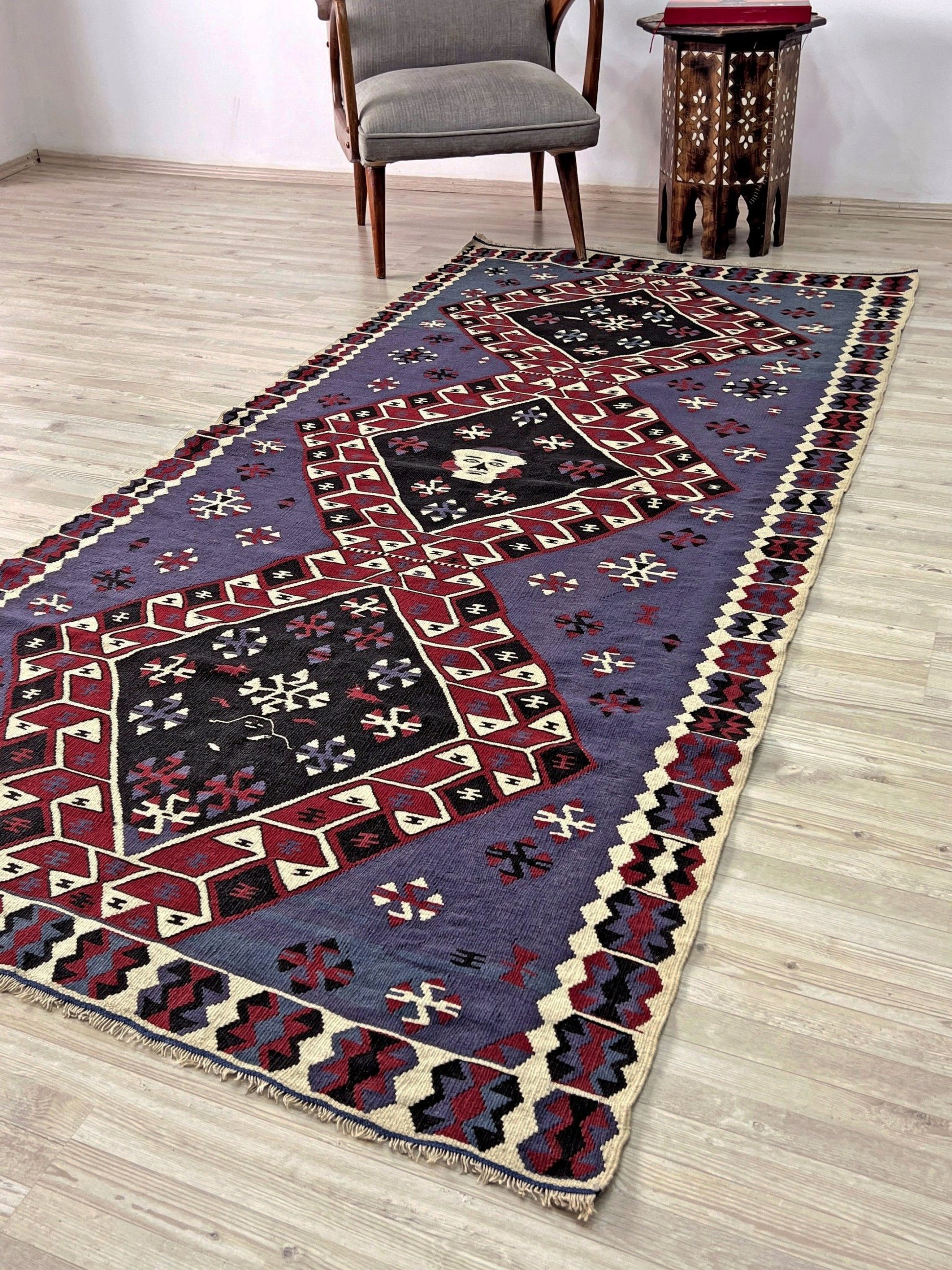 Violet blue Vintage Eastern Turkish kilim runner, 4x8, with bold geometric medallions in garnet red, ivory, navy, and black on a deep blue ground.
