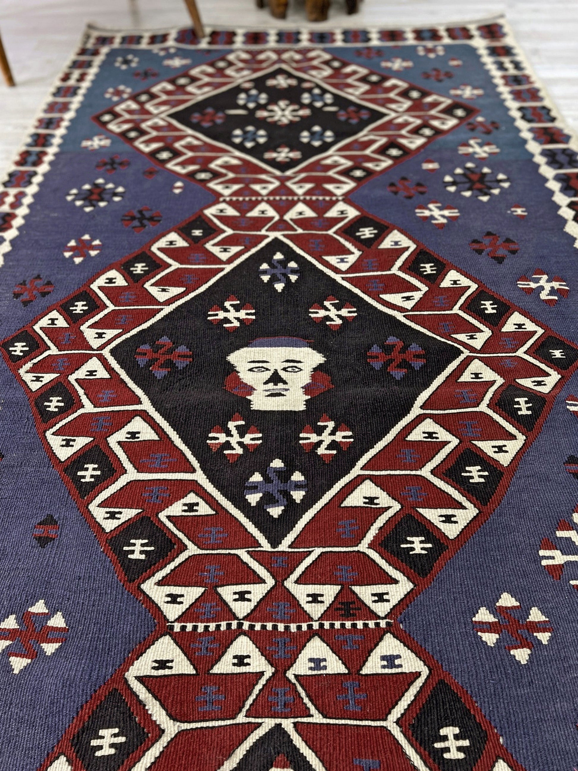 Violet blue Vintage Eastern Turkish kilim runner, 4x8, with bold geometric medallions in garnet red, ivory, navy, and black on a deep blue ground.
