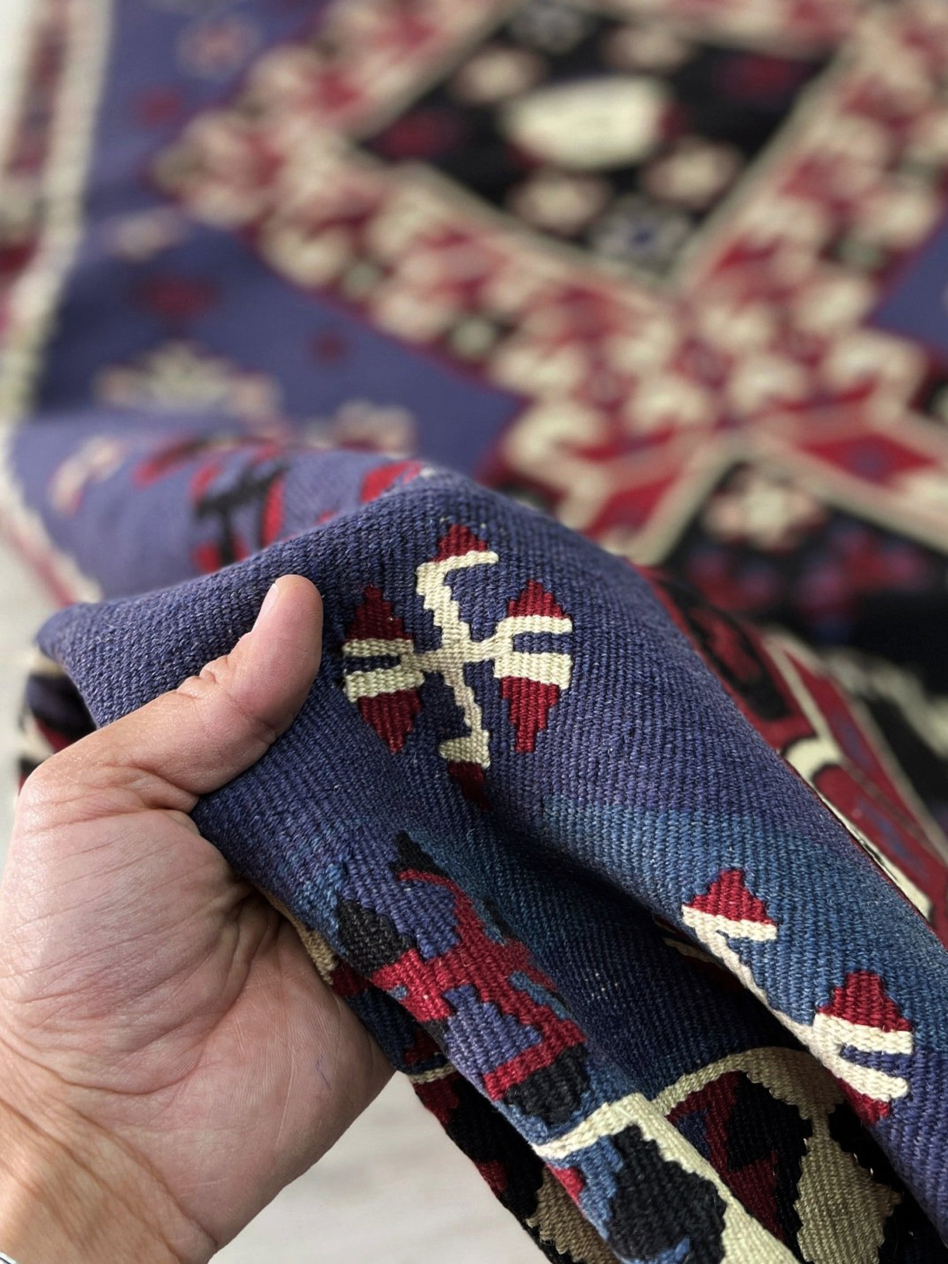Violet blue Vintage Eastern Turkish kilim runner, 4x8, with bold geometric medallions in garnet red, ivory, navy, and black on a deep blue ground.
