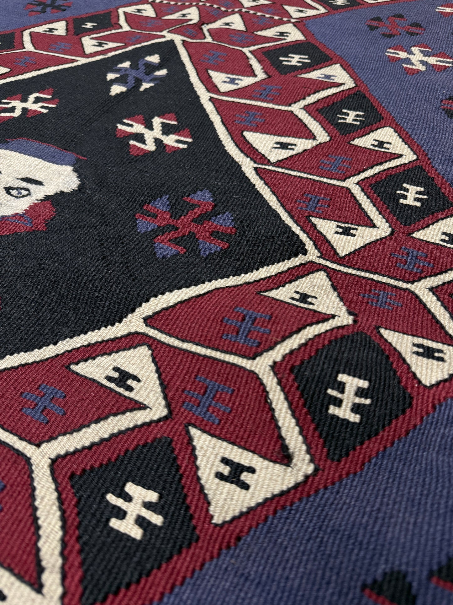 Violet blue Vintage Eastern Turkish kilim runner, 4x8, with bold geometric medallions in garnet red, ivory, navy, and black on a deep blue ground.
