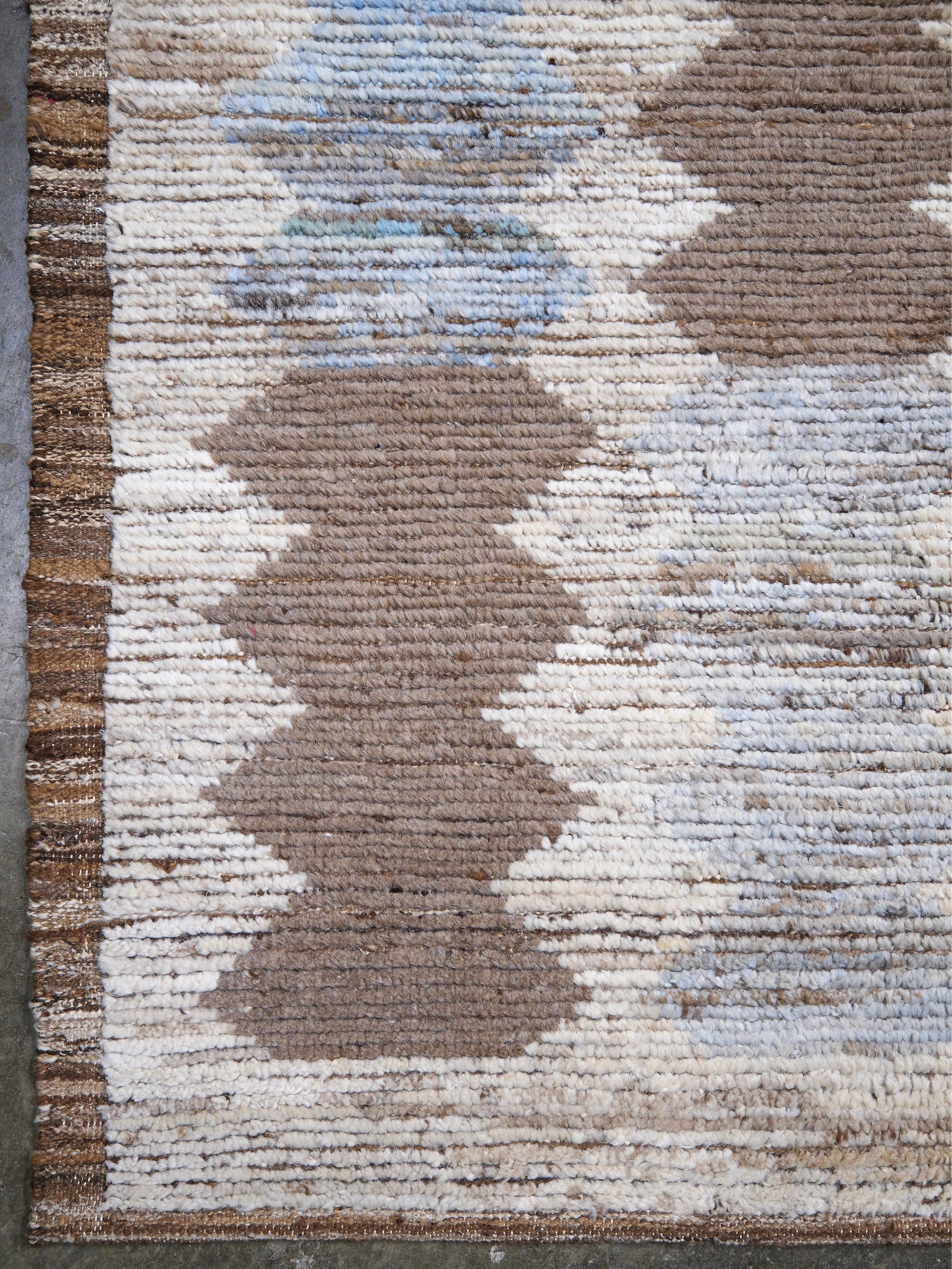 Soft blue Turkish Tulu rug with ivory, taupe and beige abstract geometric pattern, handmade textured Moroccan style wool area rug 8x10 from Indigo Rugs Burlingame Bay Area.