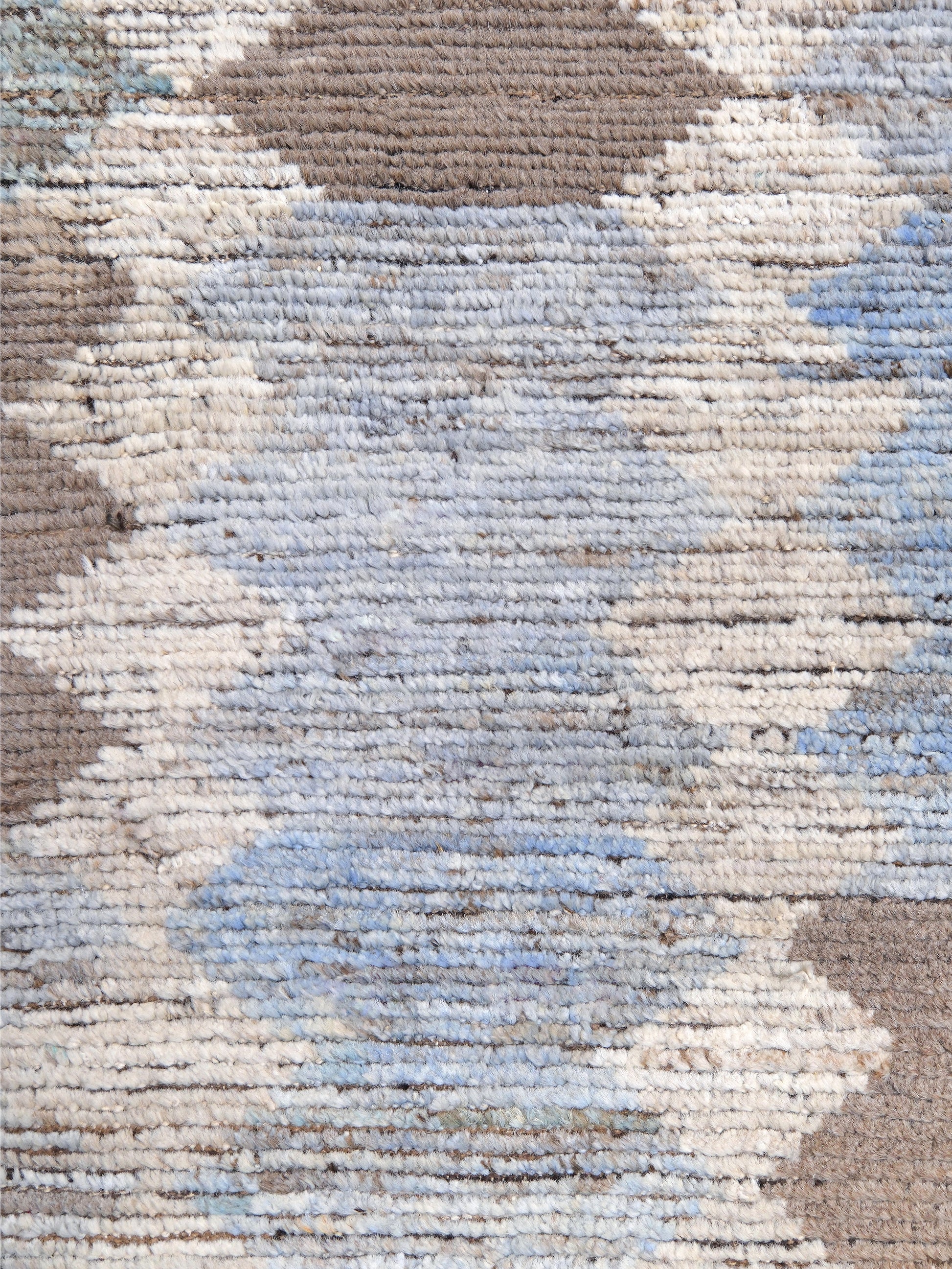 Soft blue Turkish Tulu rug with ivory, taupe and beige abstract geometric pattern, handmade textured Moroccan style wool area rug 8x10 from Indigo Rugs Burlingame Bay Area.
