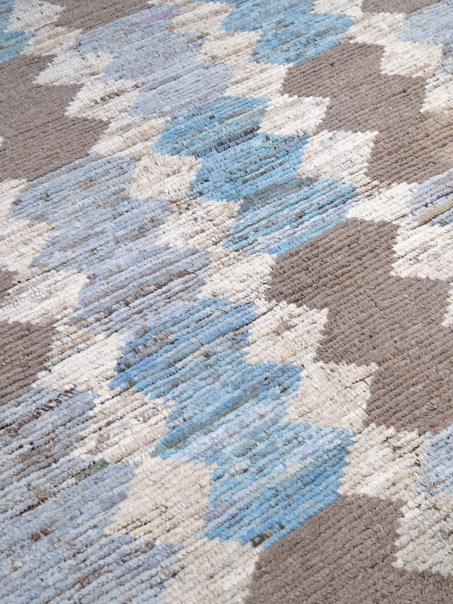 Soft blue Turkish Tulu rug with ivory, taupe and beige abstract geometric pattern, handmade textured Moroccan style wool area rug 8x10 from Indigo Rugs Burlingame Bay Area.