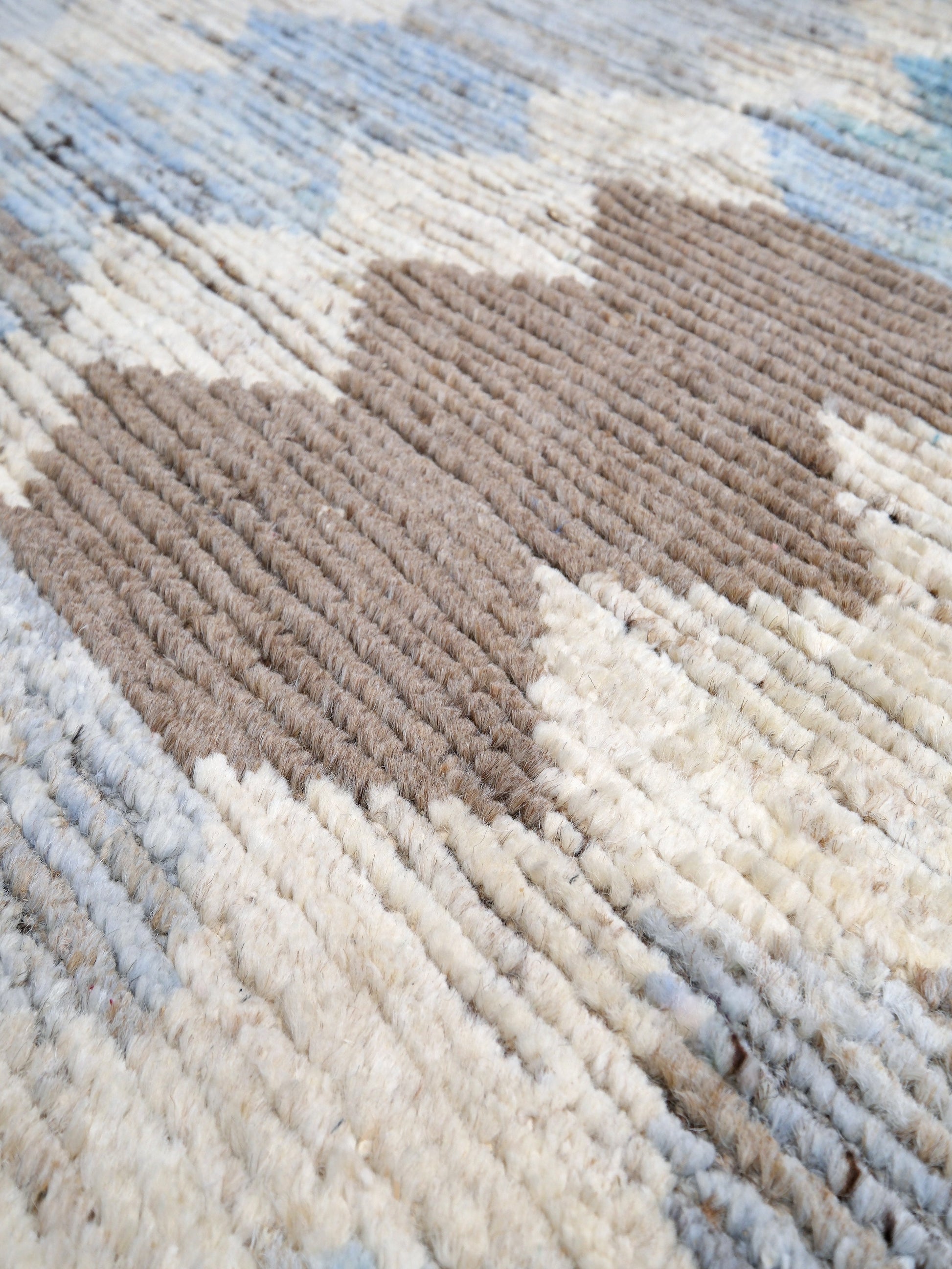 Soft blue Turkish Tulu rug with ivory, taupe and beige abstract geometric pattern, handmade textured Moroccan style wool area rug 8x10 from Indigo Rugs Burlingame Bay Area.
