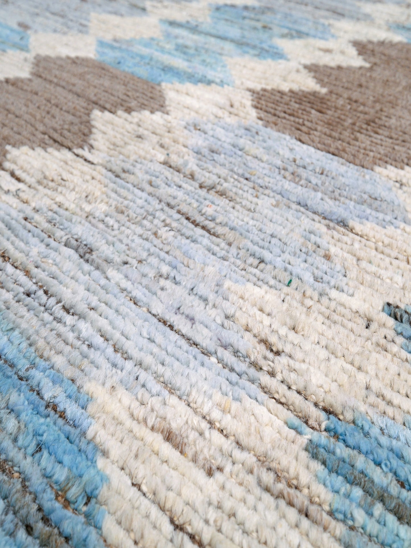 Soft blue Turkish Tulu rug with ivory, taupe and beige abstract geometric pattern, handmade textured Moroccan style wool area rug 8x10 from Indigo Rugs Burlingame Bay Area.