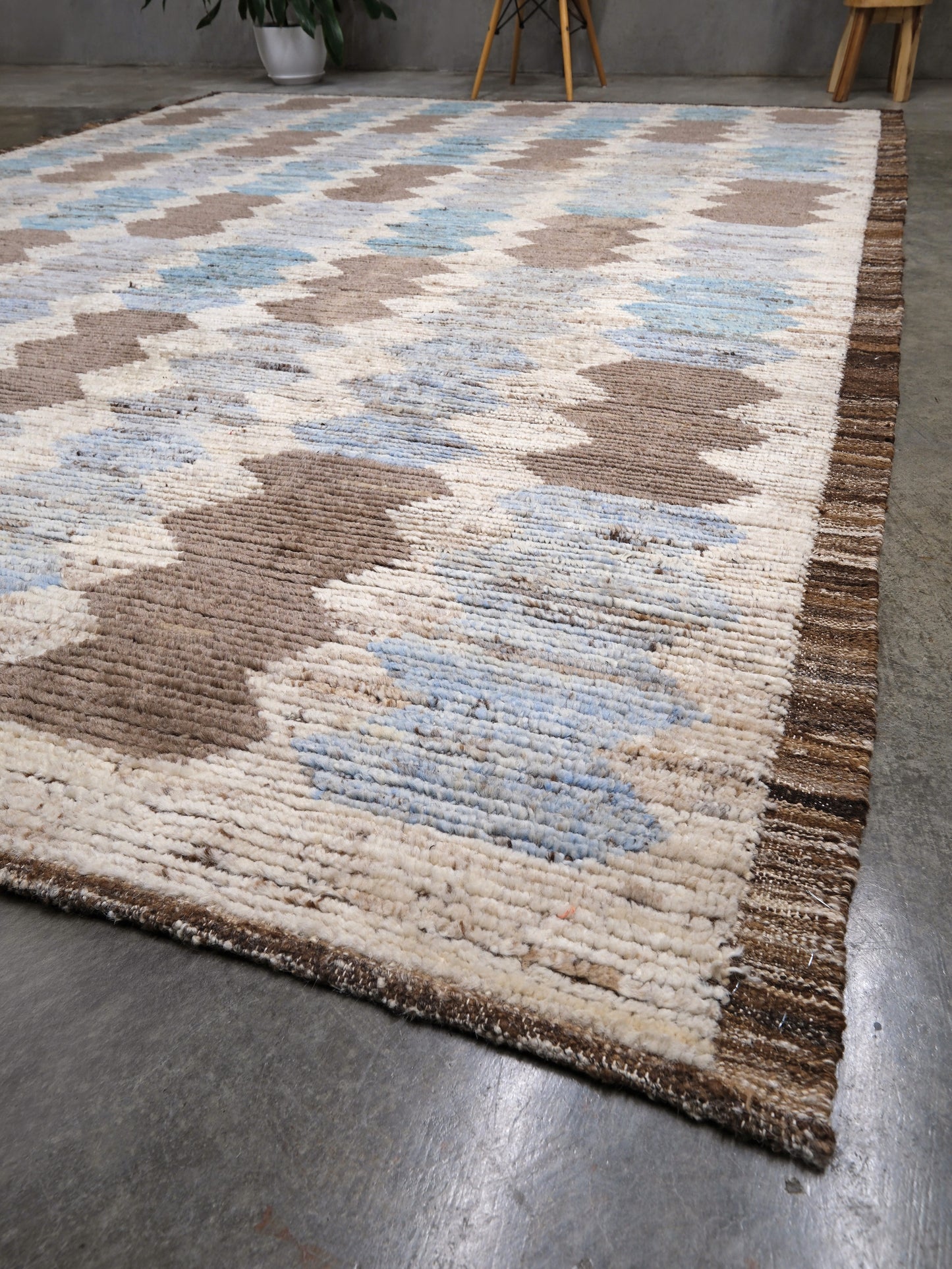 Soft blue Turkish Tulu rug with ivory, taupe and beige abstract geometric pattern, handmade textured Moroccan style wool area rug 8x10 from Indigo Rugs Burlingame Bay Area.