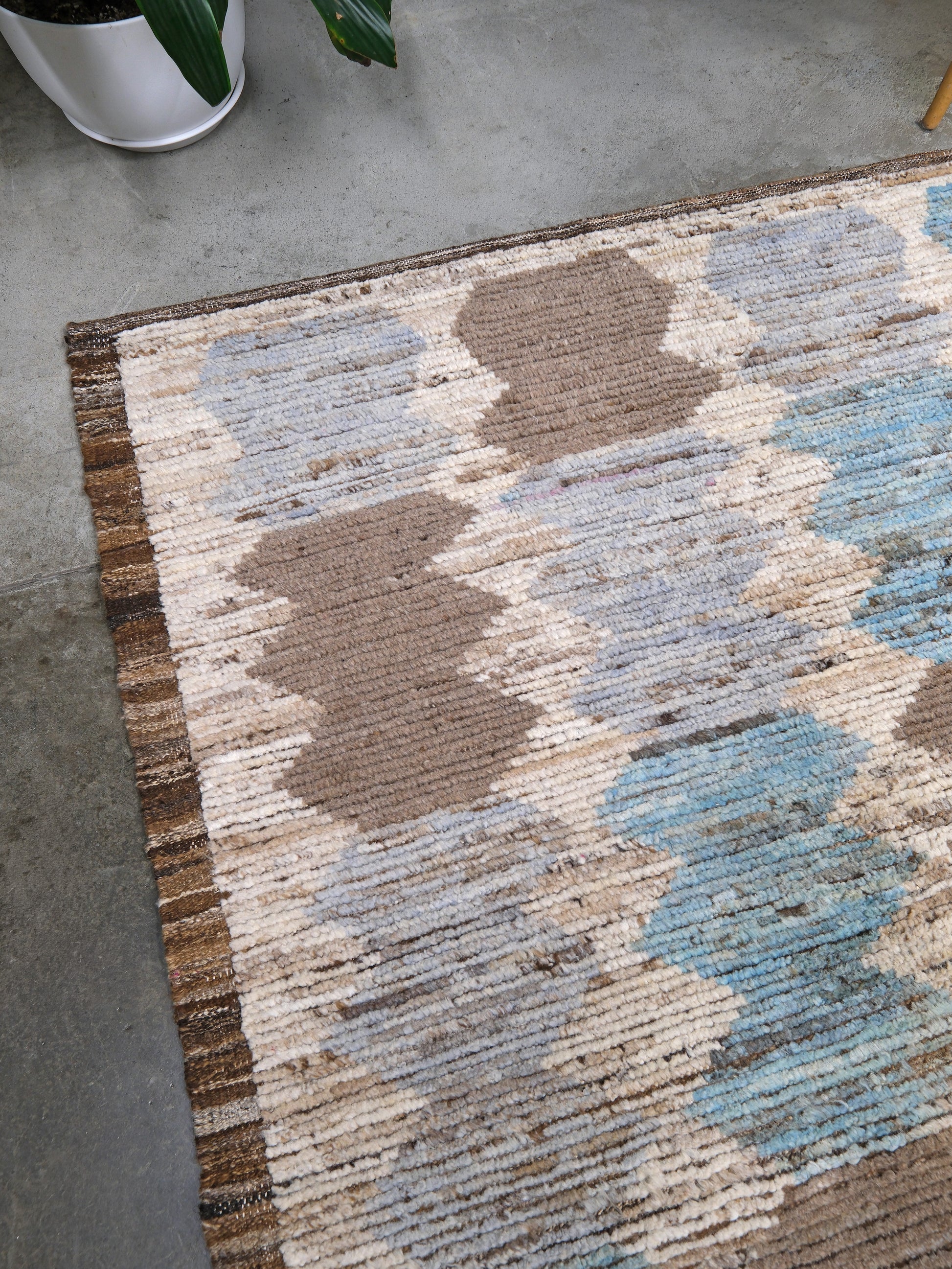Soft blue Turkish Tulu rug with ivory, taupe and beige abstract geometric pattern, handmade textured Moroccan style wool area rug 8x10 from Indigo Rugs Burlingame Bay Area.