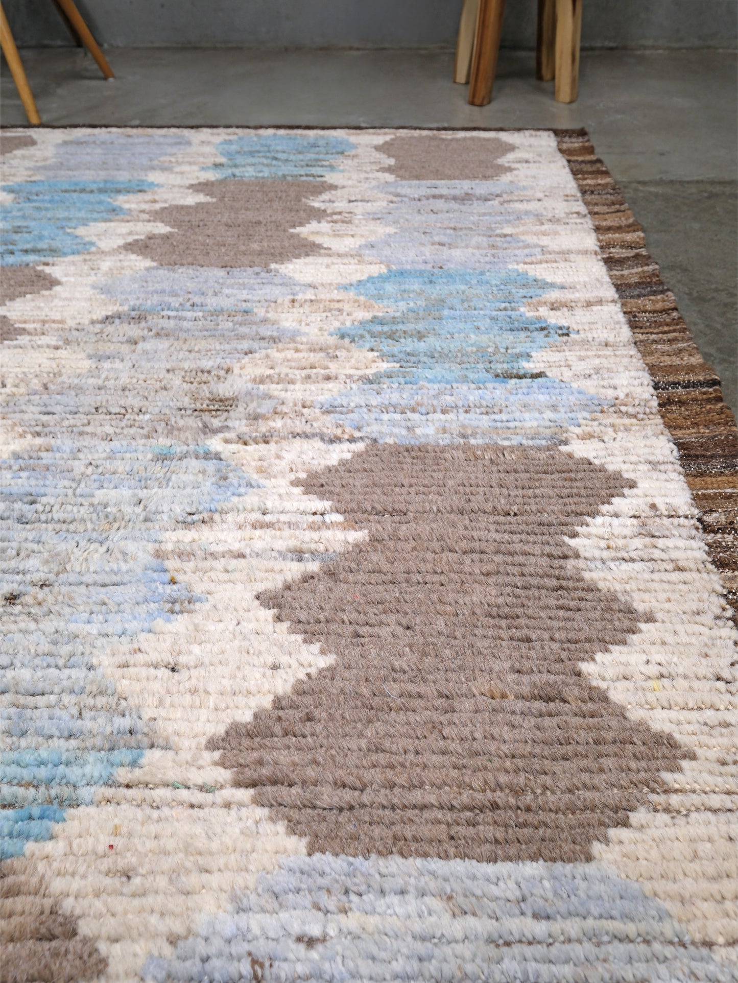 Soft blue Turkish Tulu rug with ivory, taupe and beige abstract geometric pattern, handmade textured Moroccan style wool area rug 8x10 from Indigo Rugs Burlingame Bay Area.
