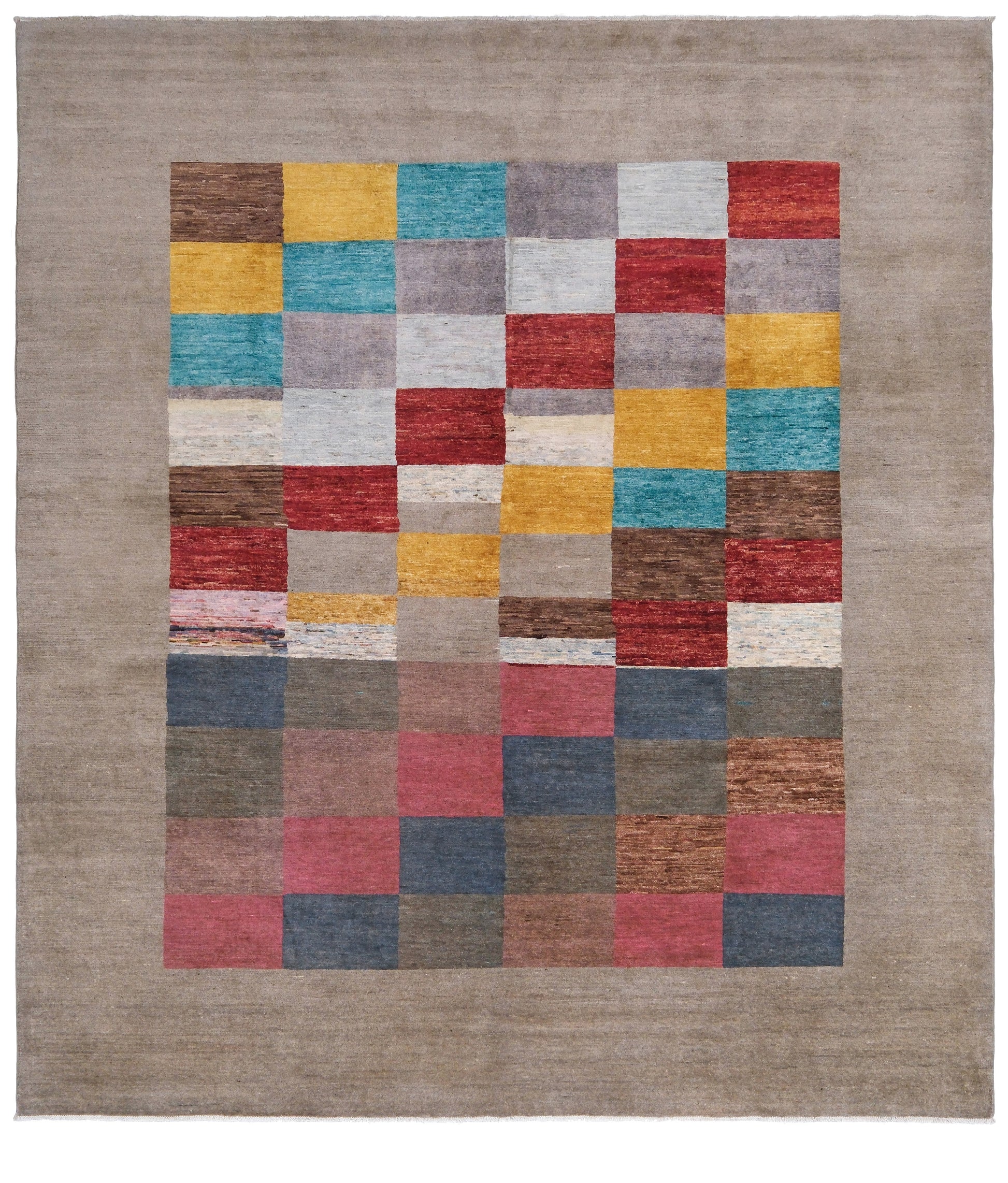 A 8x8 square handmade modern area rug featuring a central patchwork grid of multicolored textured squares on a warm taupe-beige border.