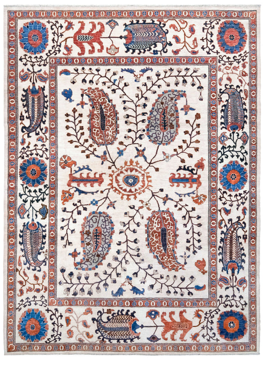 Ivory Suzani style handmade Turkish wool rug with paisley motifs, branching vines, flowers, indigo blue and rust accents, 9x12 from Indigo Rugs Burlingame Bay Area.