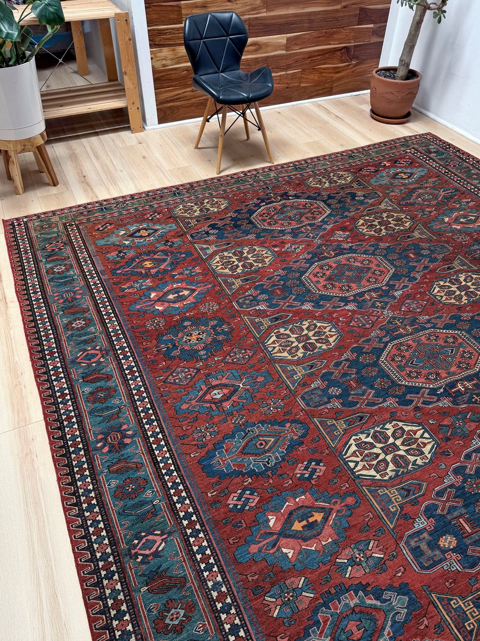 Antique Caucasian Soumak rug with madder red and indigo blue geometric medallions, woven in the South Caucasus circa 1925, available at top-rated rug shop in San Mateo, SF Bay Area with free shipping.