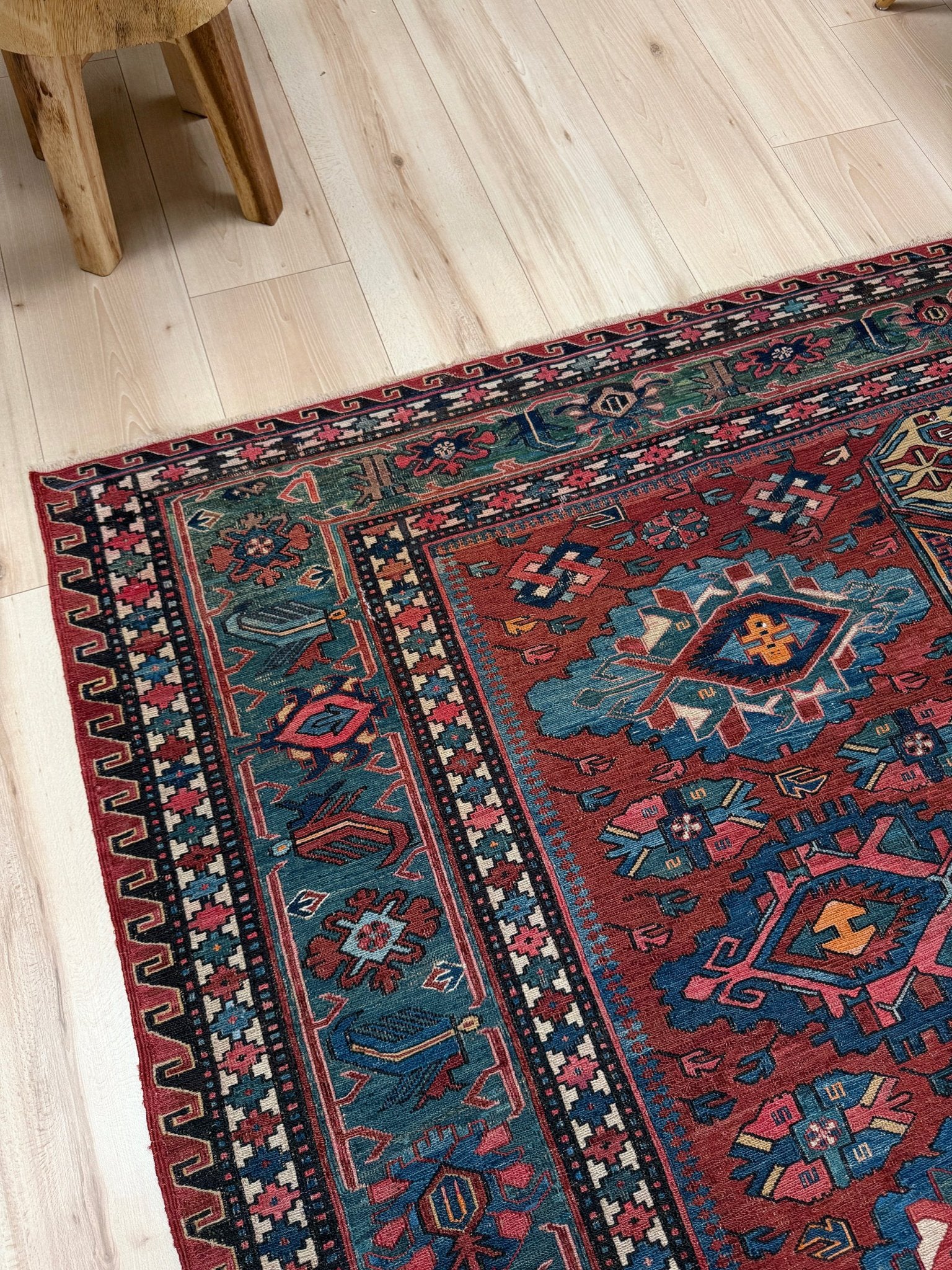 Antique Caucasian Soumak rug with madder red and indigo blue geometric medallions, woven in the South Caucasus circa 1925, available at top-rated rug shop in San Mateo, SF Bay Area with free shipping.
